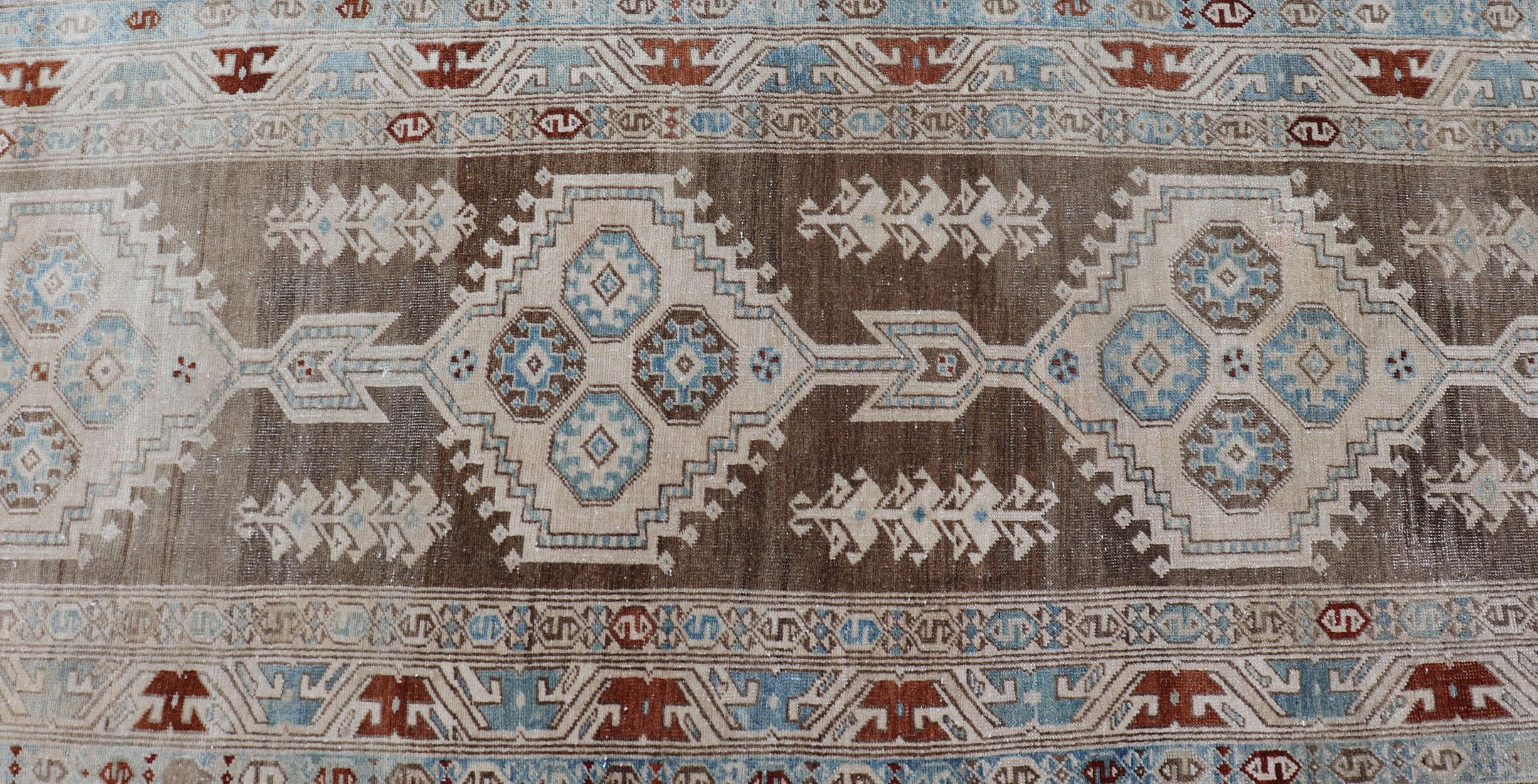 Long Persian Heriz Runner with Central Medallions in Brown, Blue, Tan & Red In Good Condition For Sale In Atlanta, GA