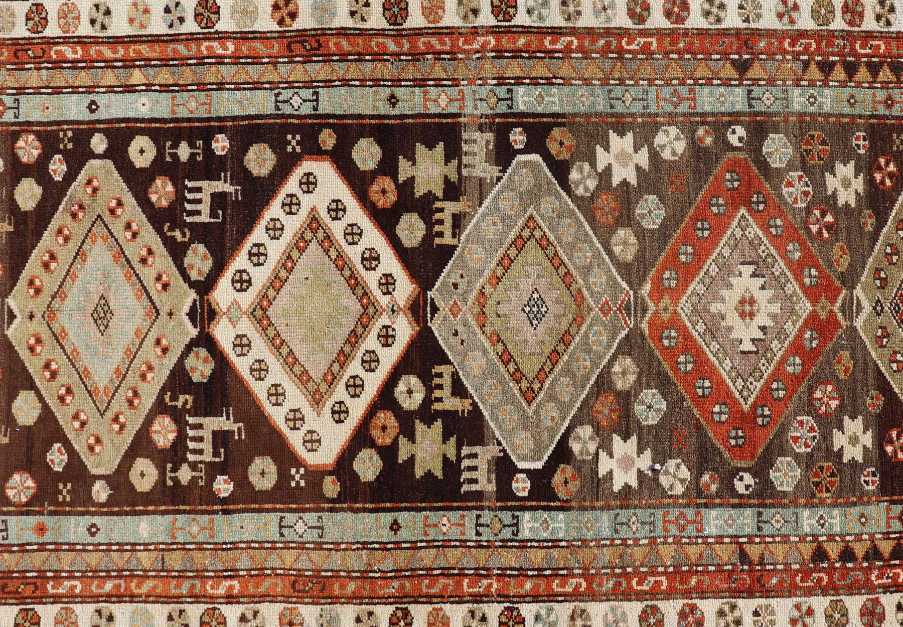 Long Persian Kurdish Runner with Medallion Design in Brown, Orange and Cream For Sale 3