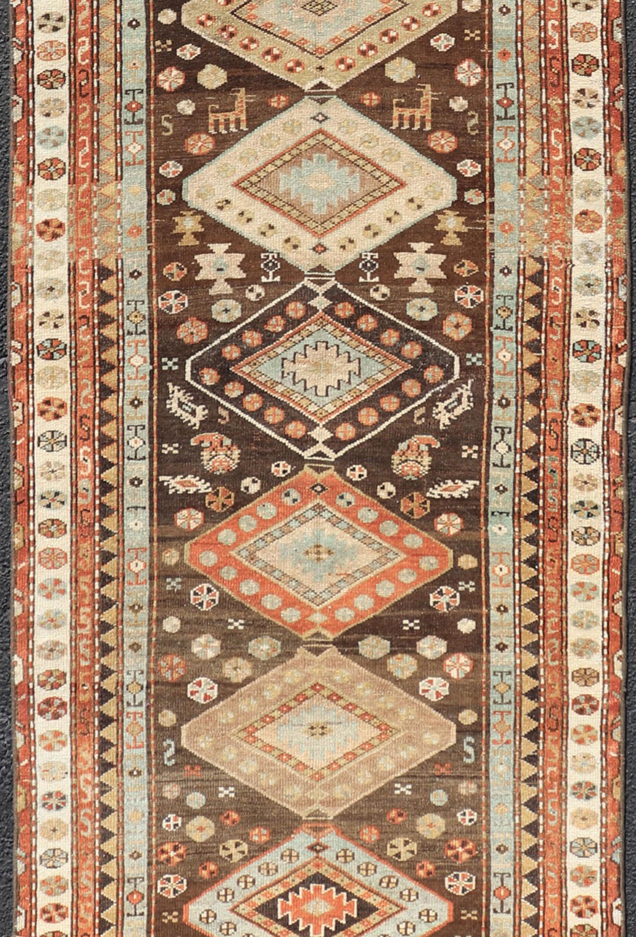 Hand-Knotted Long Persian Kurdish Runner with Medallion Design in Brown, Orange and Cream For Sale