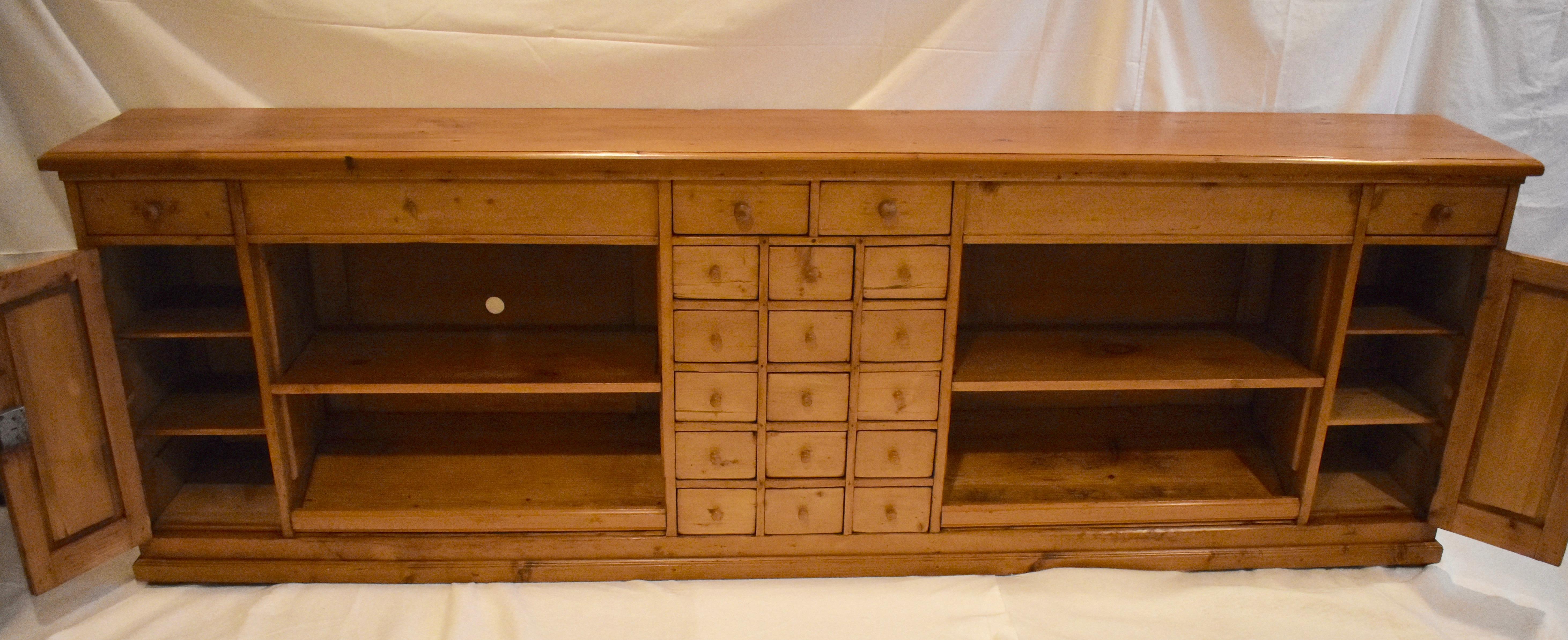 Polished Long Pine Sideboard with Nineteen Drawers