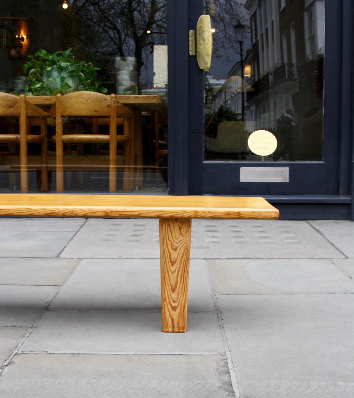 A long bench handmade from solid pine in Sweden in the mid-1950s. The proportions, construction and materials of the design make it very practical. Further, the absence of obvious decoration and other superfluous details mean the piece could be
