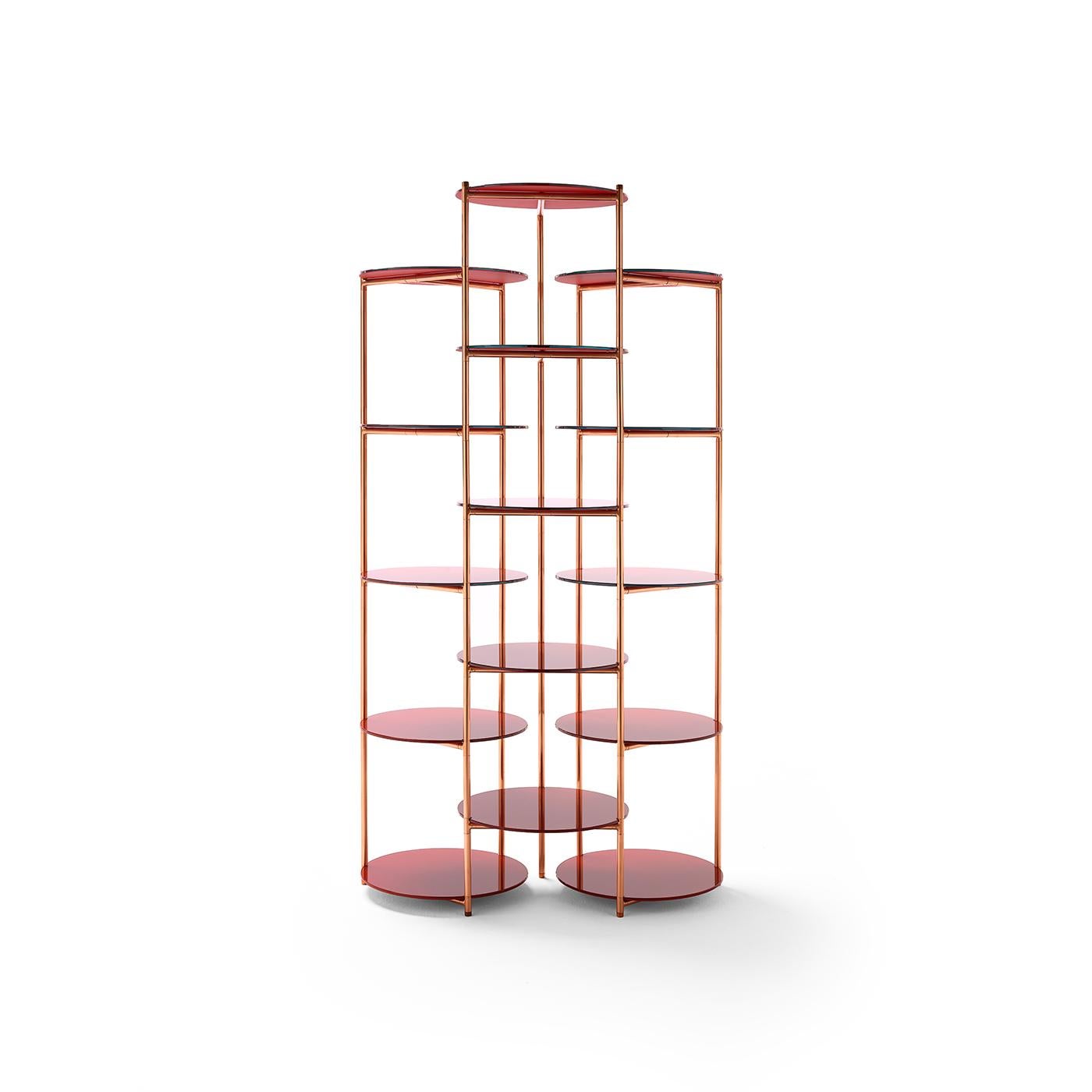 Built with a cylindrical frame combining steel and copper, this glamorous étagère has an open design. The three columns each feature five shelves in back-painted glass, creating a reflective, two-tone look that both pleases the eye and offers plenty