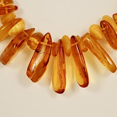 Long Polished Amber Graduated Bead Drop Necklace circa 1930s