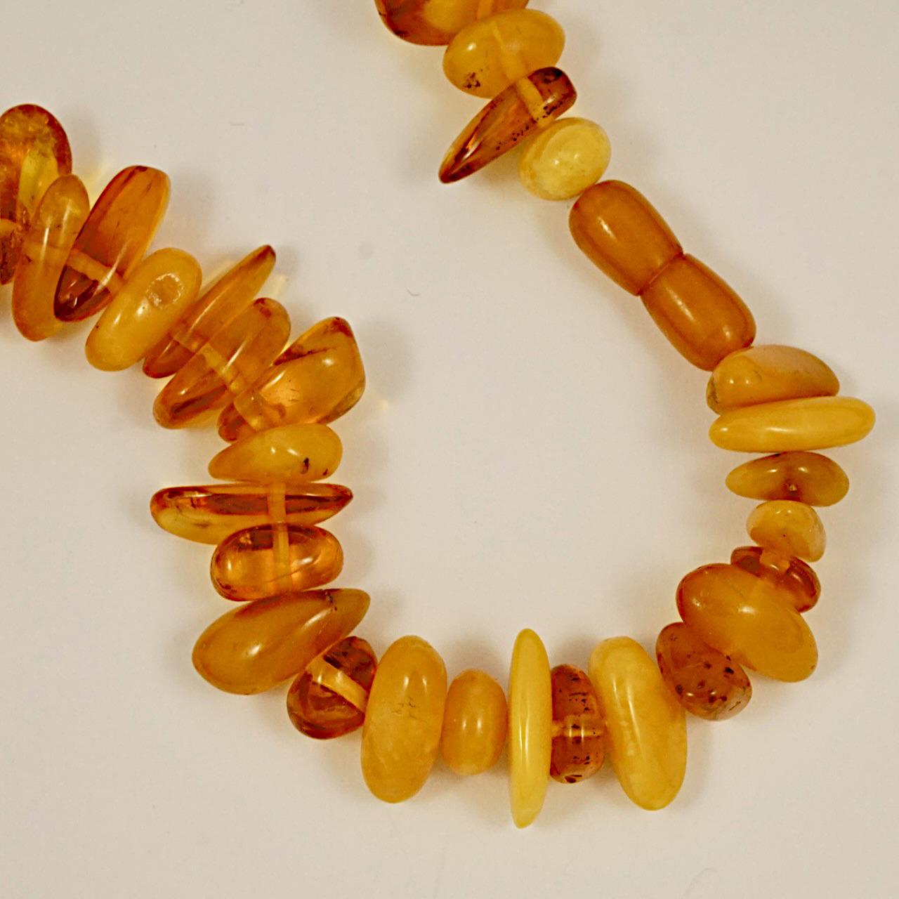 Mixed Cut Long Polished Amber Graduated Bead Drop Necklace circa 1930s For Sale