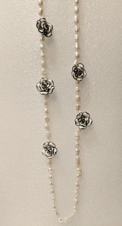 Long River Pearl Necklace with Chanel-type Resin Flowers.