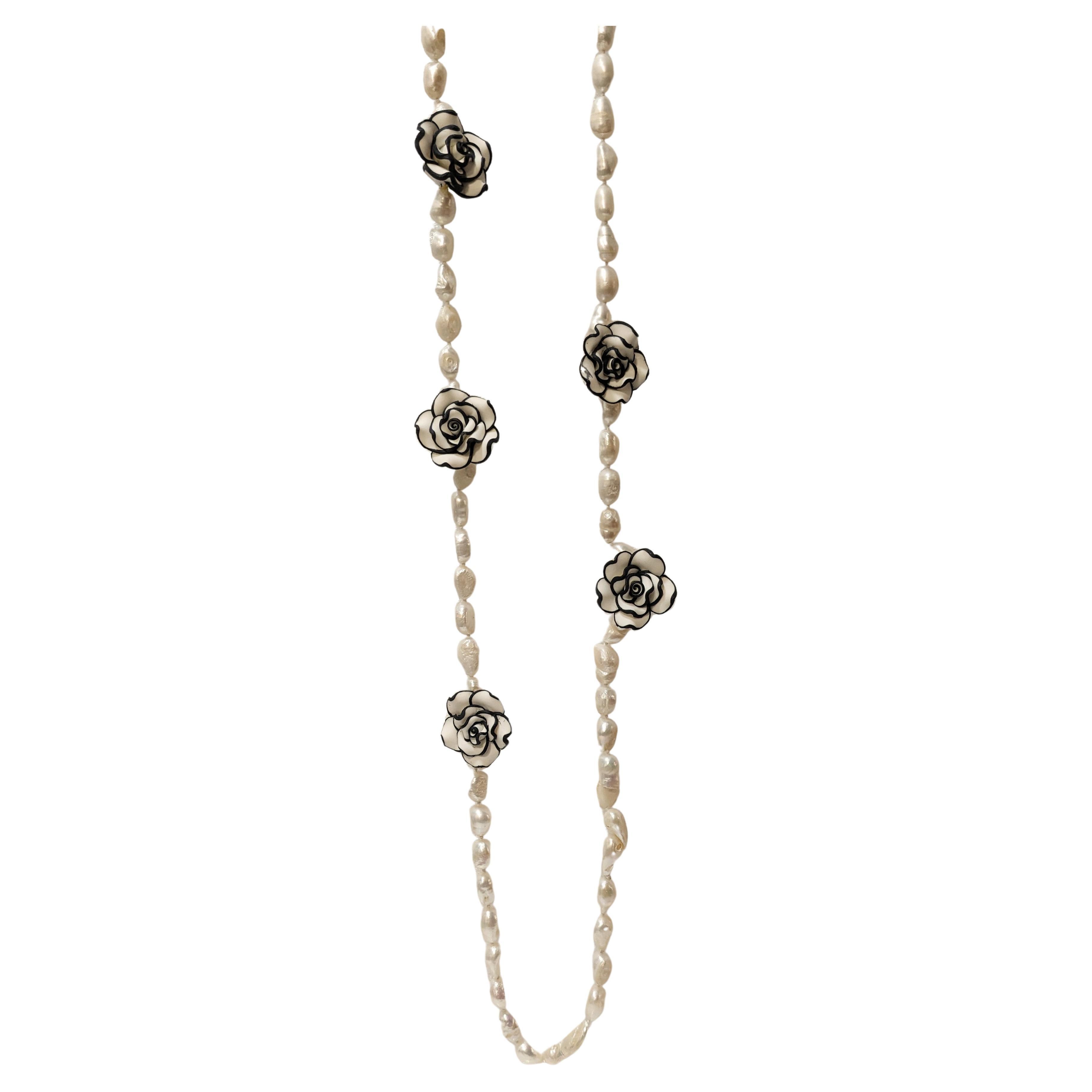  Long River Pearl Necklace with Chanel-type Resin Flowers. For Sale