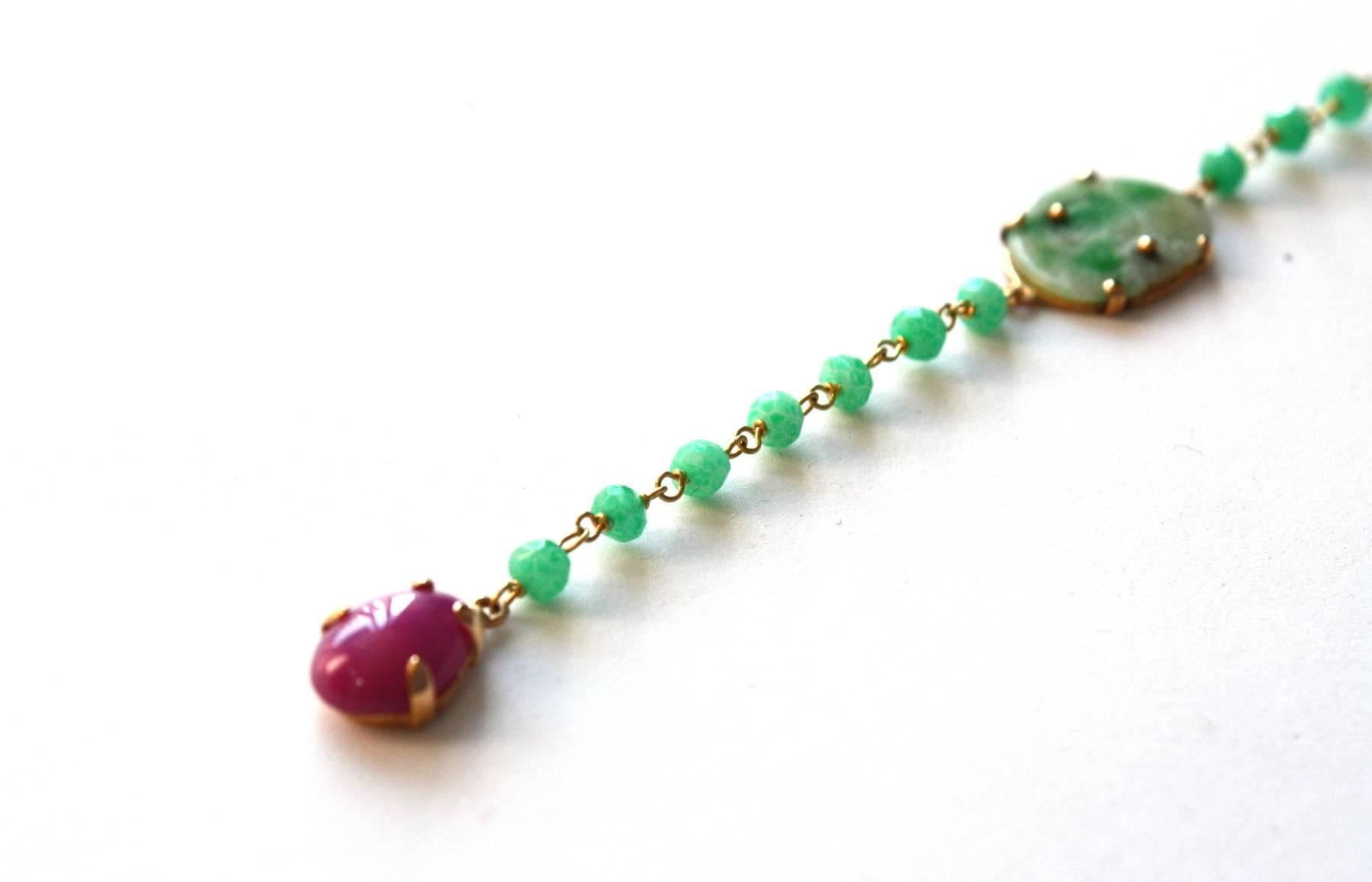 Very nice long necklace 41cm, with faced apple green emerald little antiques Chinese jade coming from a hair pin, tourmaline, star ruby drop, 18kt gold gr 12.
All Giulia Colussi jewelry is new and has never been previously owned or worn. Each item