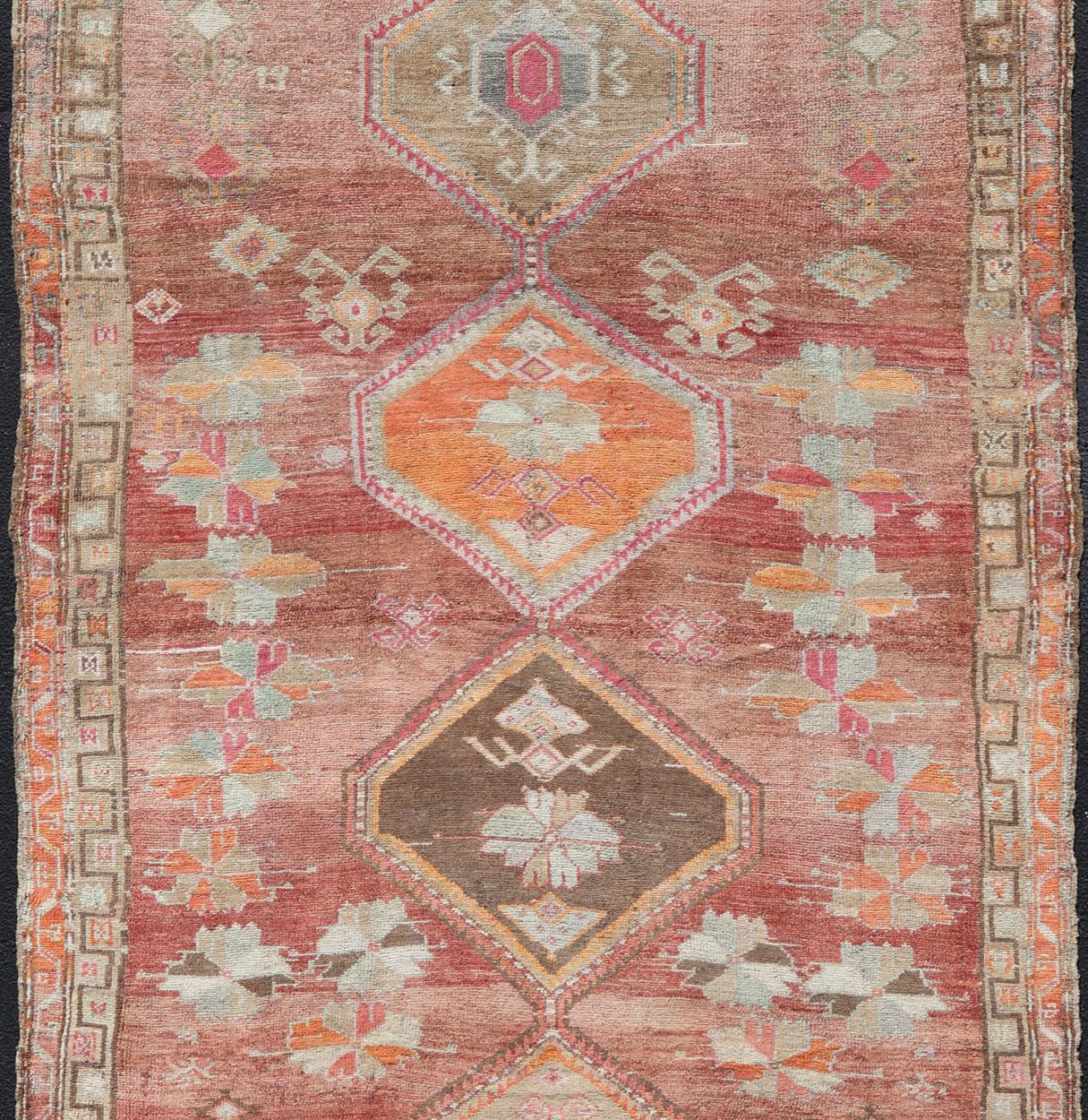 Oushak Long Rug, Vintage Turkish Gallery Rug with Tribal Design in Variegated Red For Sale