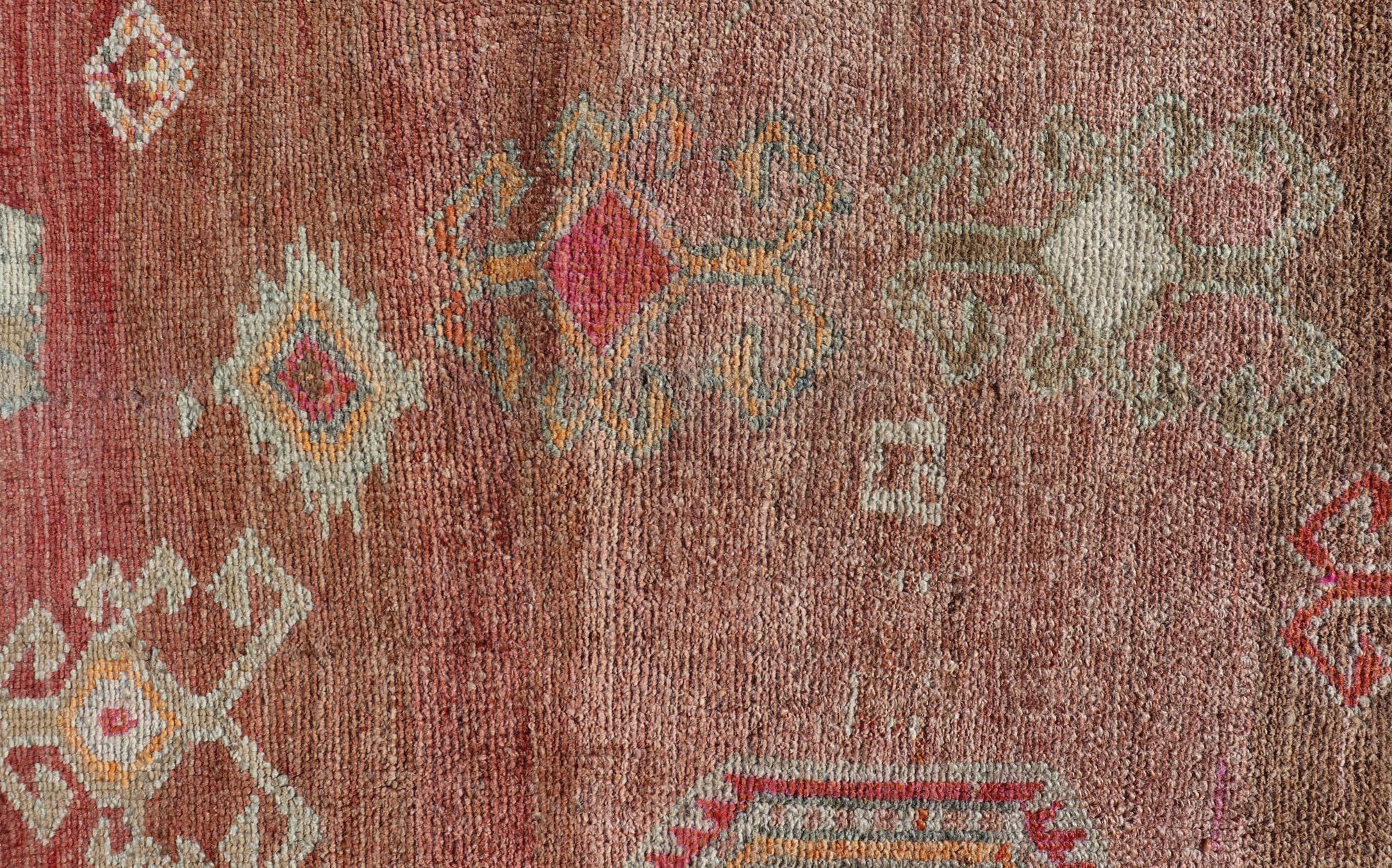 20th Century Long Rug, Vintage Turkish Gallery Rug with Tribal Design in Variegated Red For Sale