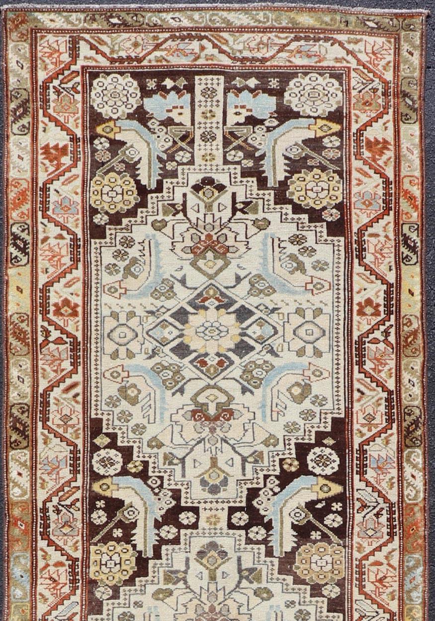 Antique Runner Persian Malayer with all-over intricate floral design in multi-colors, Keivan Woven Arts / rug SUS-2012-635, country of origin / type: Iran / Malayer, circa 1920

This antique Persian Malayer runner, circa early 20th century, relies