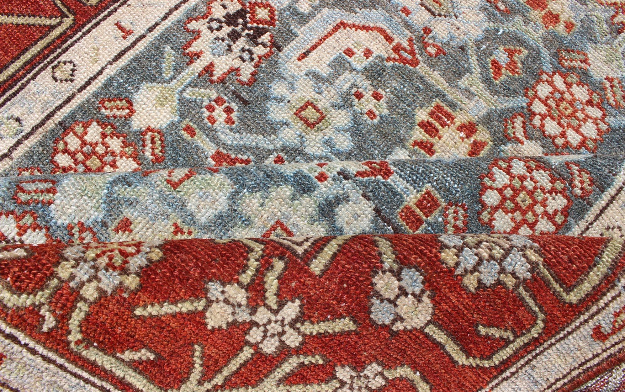 Early 20th Century Long Runner in Blue and Red Antique Persian Malayer with All-Over Floral Design For Sale