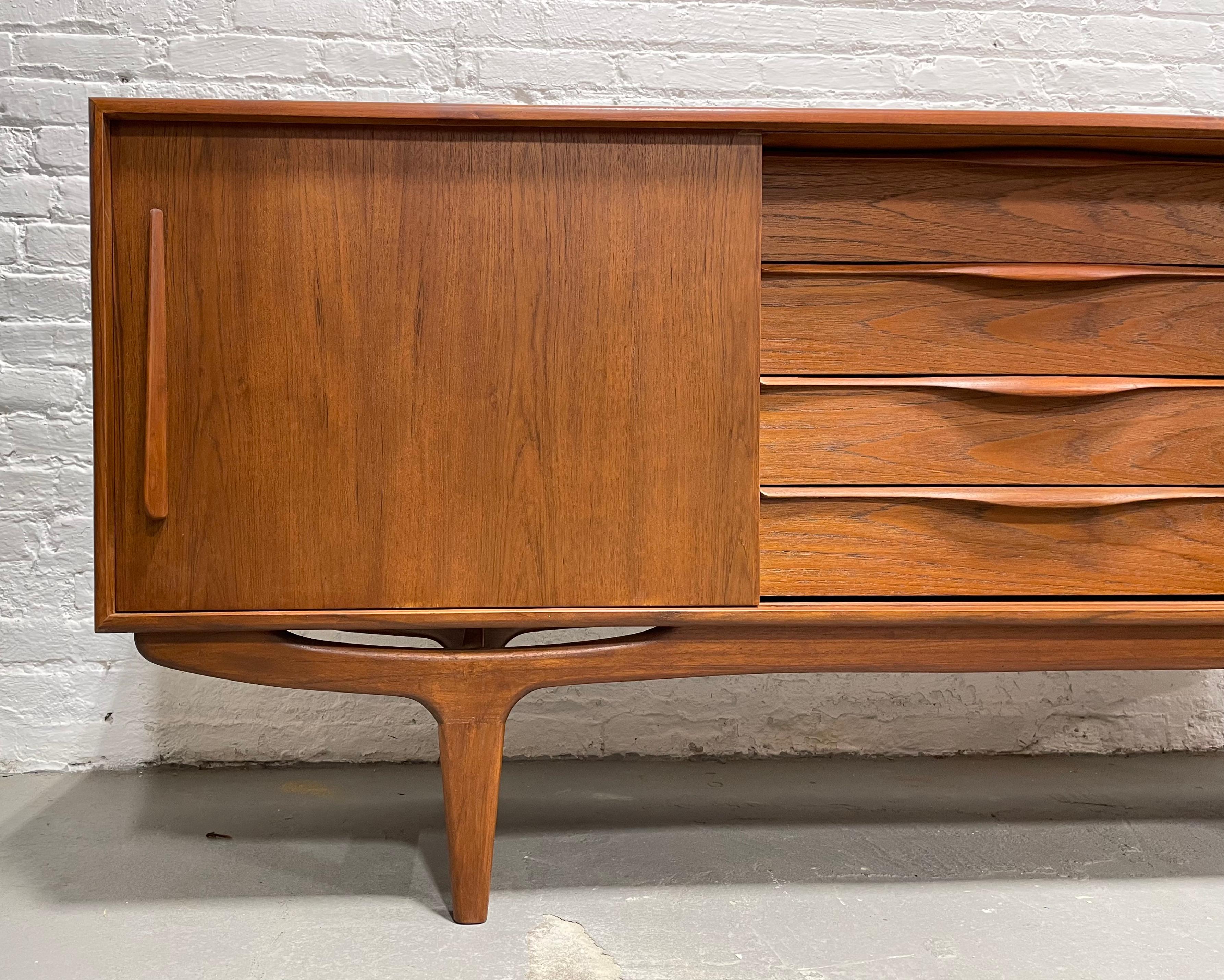 Contemporary Long Sculpted Mid-Century Modern Styled Danish Teak Credenza For Sale