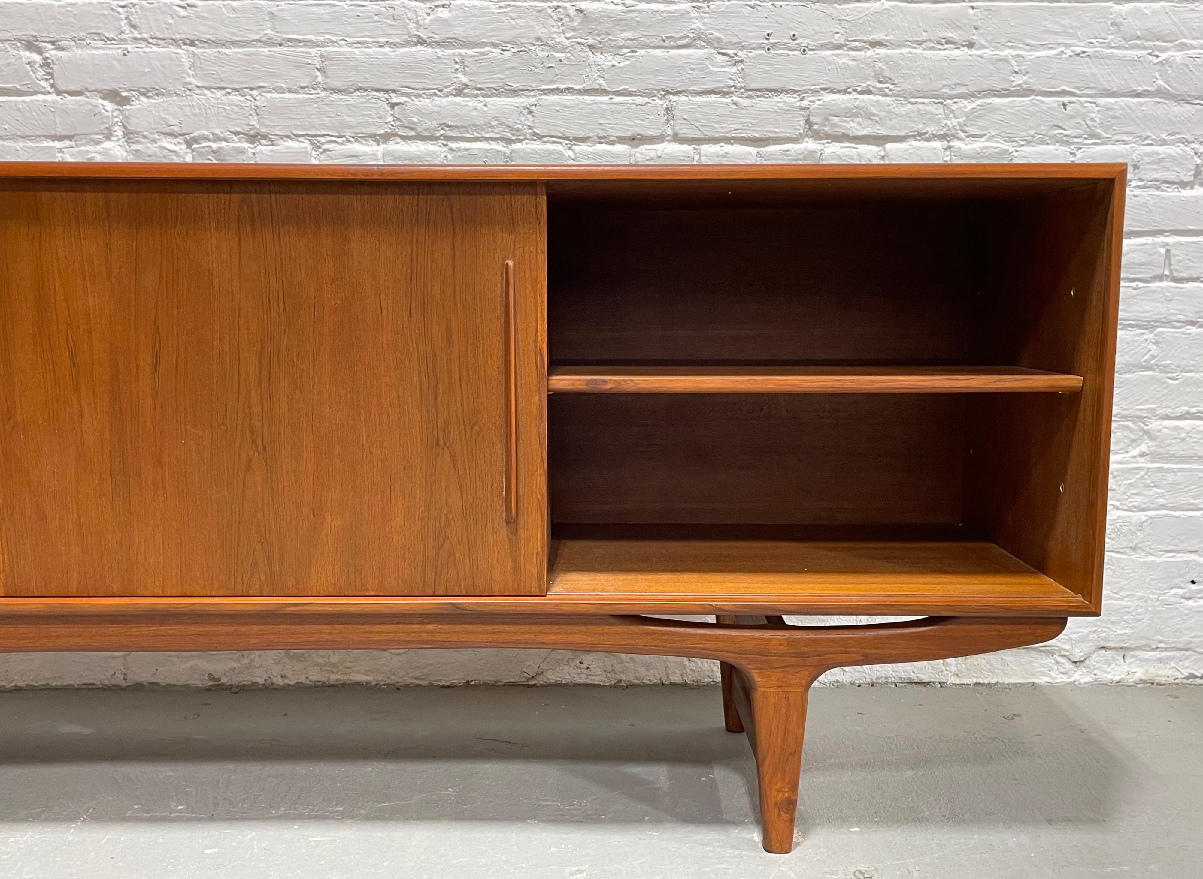 Long Sculpted Mid-Century Modern Styled Danish Teak Credenza For Sale 2