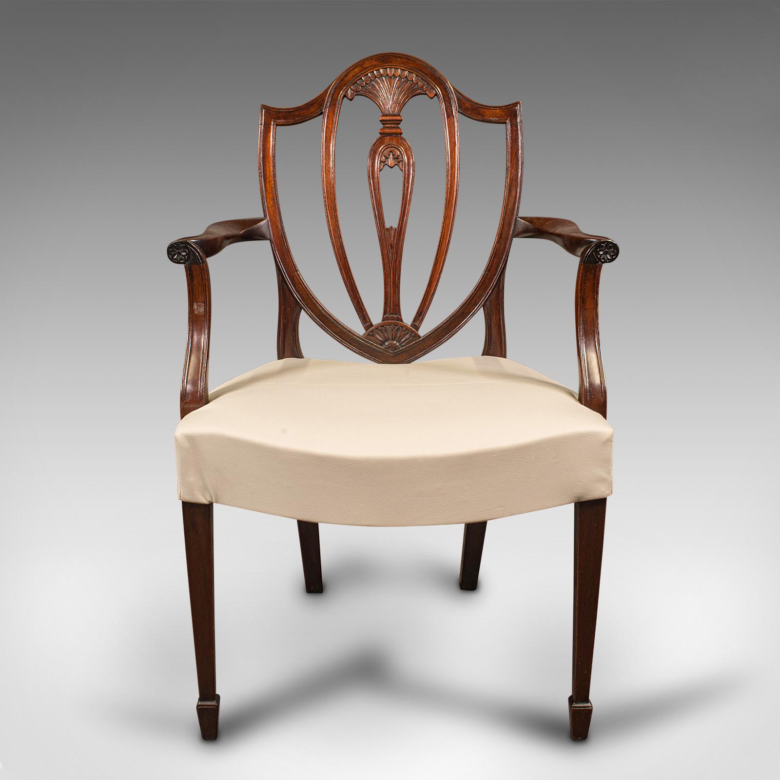 This is a long set of 14 antique dining chairs. An English, mahogany seat in Chippendale revival taste, dating to the late Victorian period, circa 1900.

Extraordinary suite of fourteen chairs for the grandest of dining rooms
Of generous width,