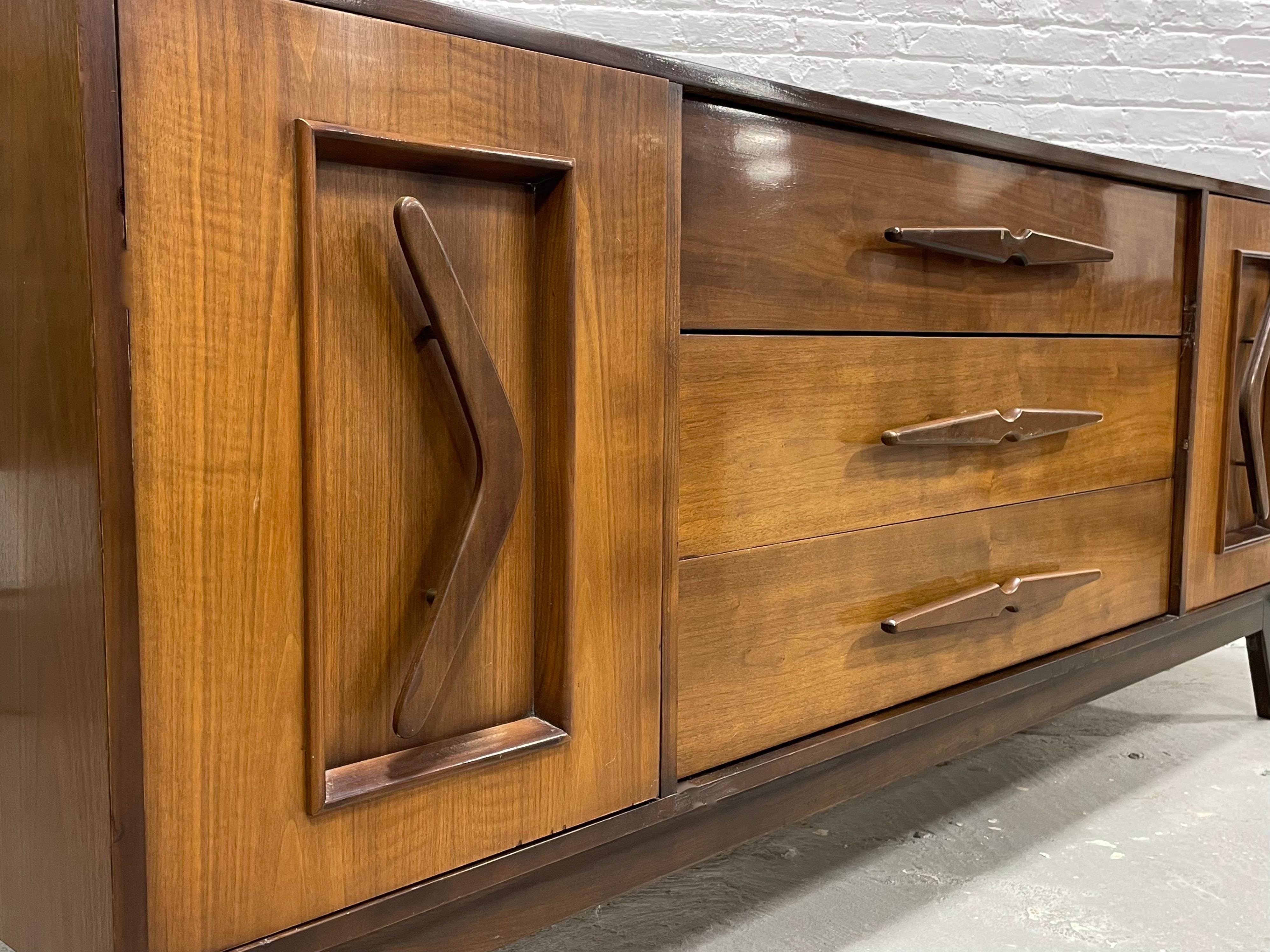 Wood Long + Sexy Mid-Century Modern Sculpted Dresser / Sideboard, circa 1960s For Sale