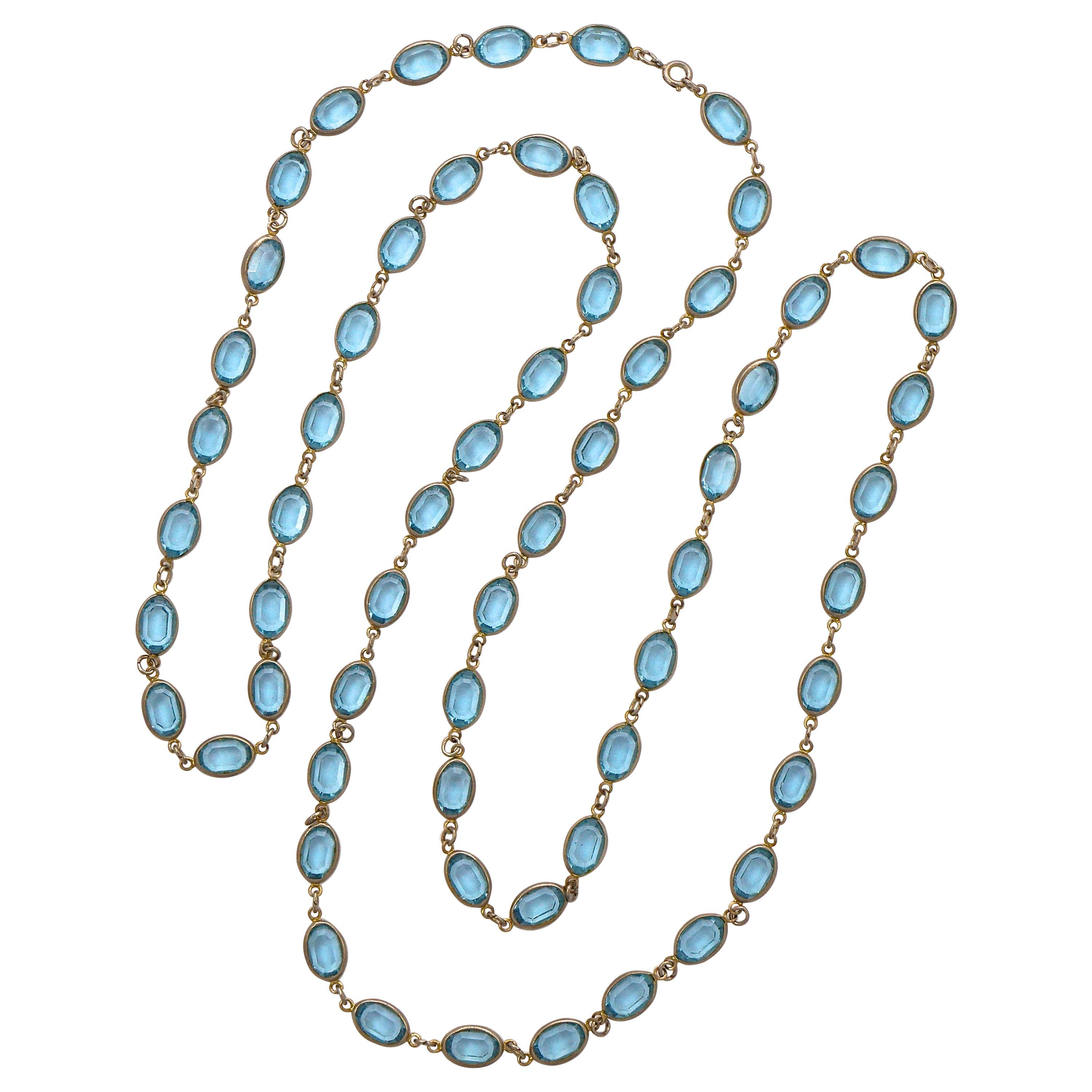 Long Silver Tone and Bezel Set Open Back Oval Blue Glass Link Necklace