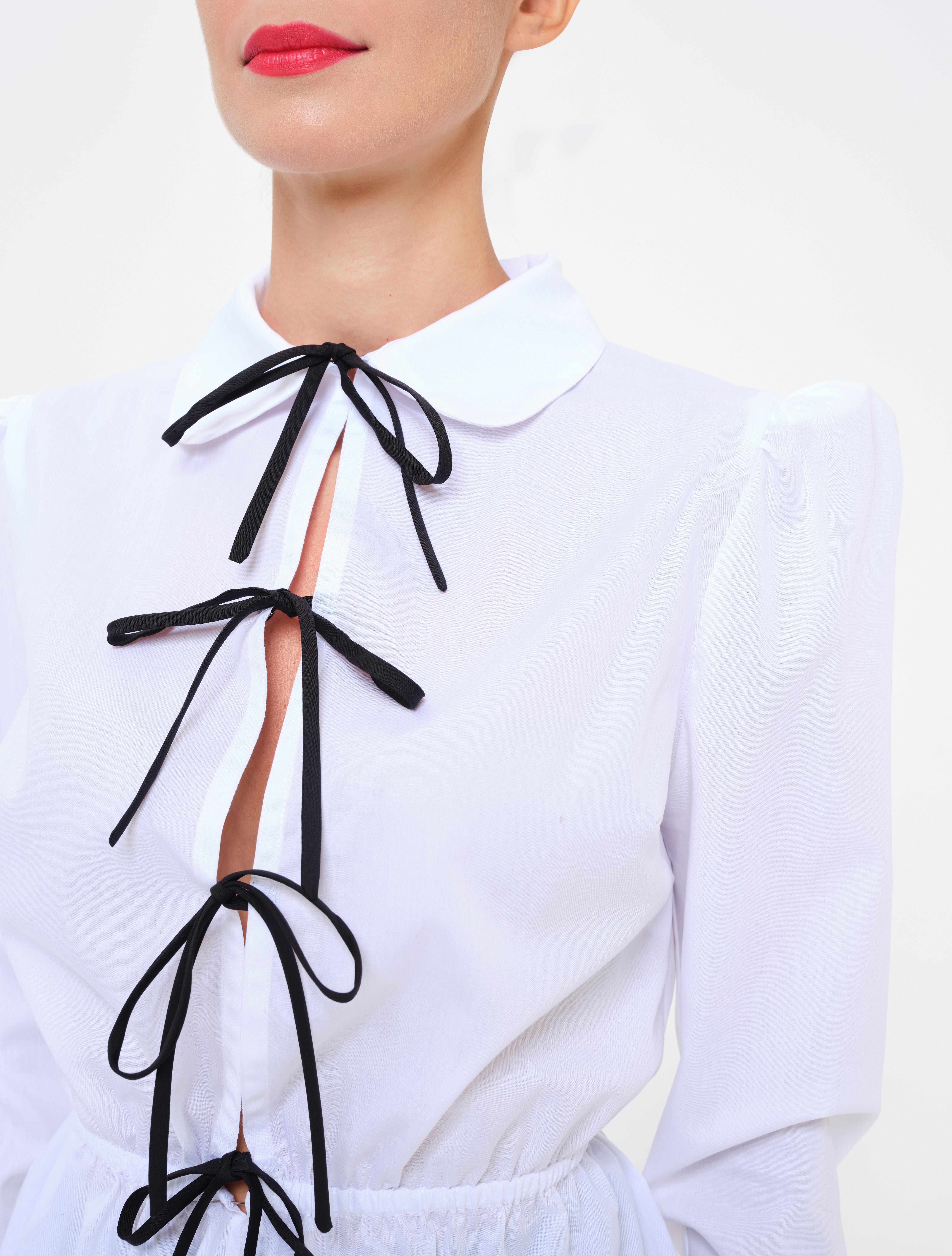 Long-sleeved shirt, puffed shoulders, functional bows and contrasting black buttons,high cuffs, and rounded collar, curled up waist.