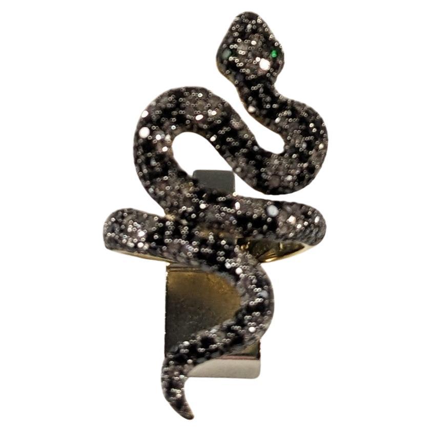 Contemporary Long Snake Diamonds and Tsavorites ring  in 18k Gold & Silver For Sale