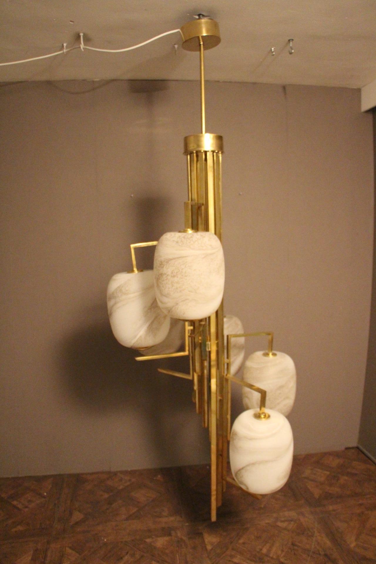 Mid-Century Modern Long Spiral Chandelier in Brass and Murano Glass Globes Looking like Alabaster