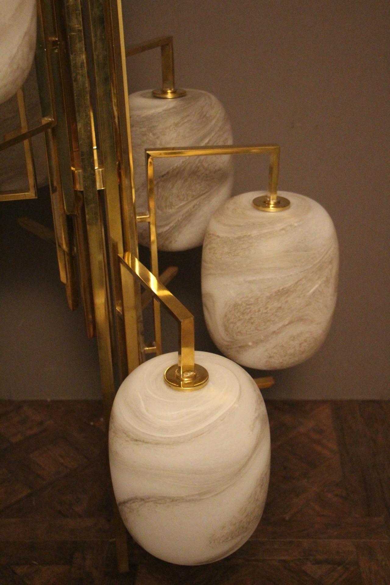 Long Spiral Chandelier in Brass and Murano Glass Globes Looking like Alabaster 1
