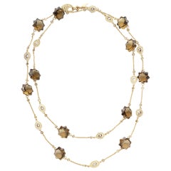 Long collier étoile de mer en or jaune 20 carats avec quartz cognac et diamants