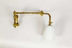 Long Swing Arm Brass Sconce with Glass Shade by Ann Morris