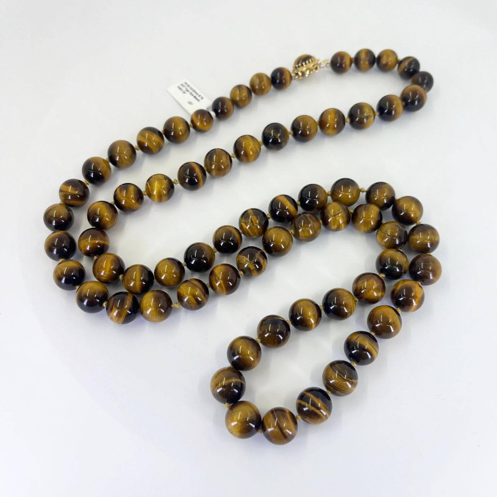 Collana di perle di occhio di tigre da 10 mm-12 mm con chiusura in oro giallo 14 carati. Lunghezza 36 pollici.