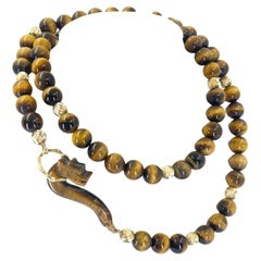 Long collier de perles oeil de tigre avec fermoir dragon