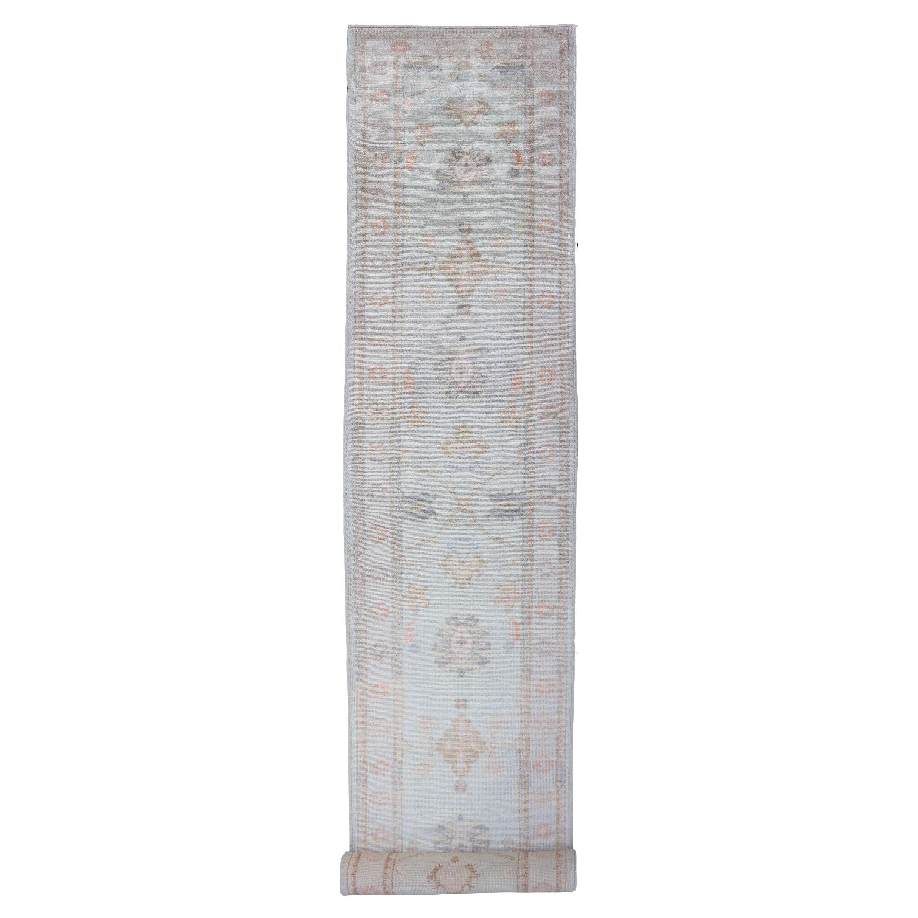 Long Turkish Oushak Runner in Ivory with Faded Green and Terracotta 2
10 x 21
0