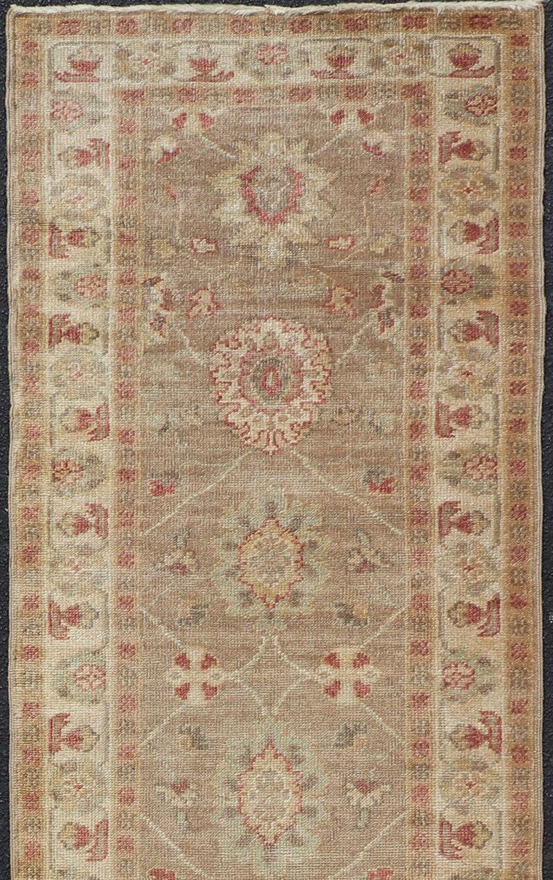 Turkish Oushak runner, rug JT-6032, country of origin / type: Turkey / Oushak, circa late-20th century

Measures: 2'8 x 18'2.

This traditional Oushak runner from Turkey features a subdued color palette and an elegant design, surrounded