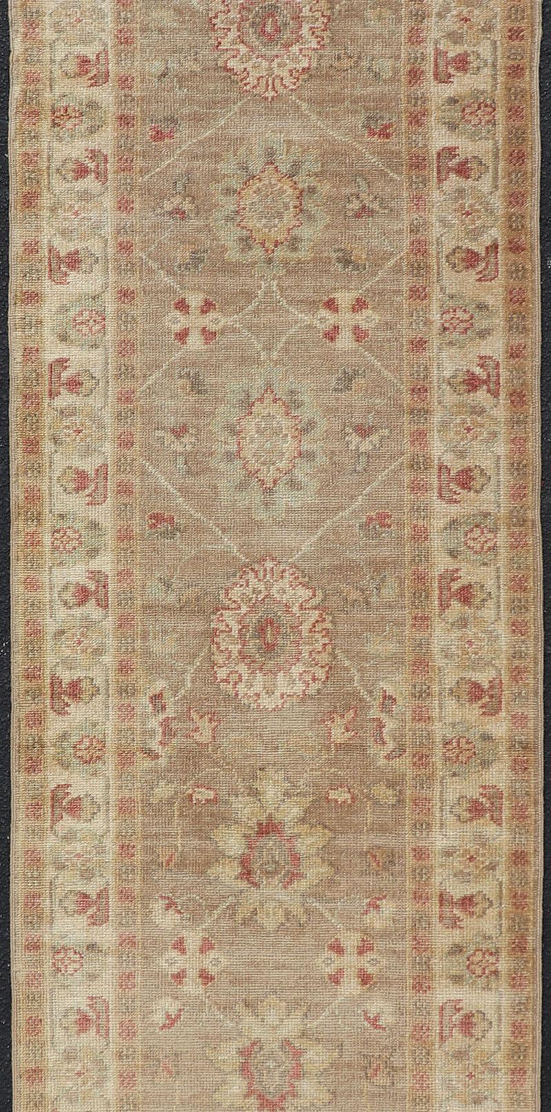Hand-Knotted Long Turkish Oushak Runner with All-Over Design in Light Brown, Tan & Red For Sale