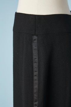 Long tuxedo black wool pencil skirt with silk branded lining Chanel