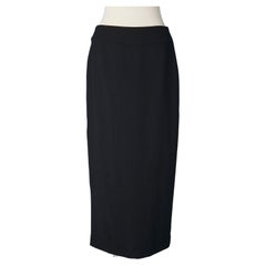 Long tuxedo black wool pencil skirt with silk branded lining Chanel 
