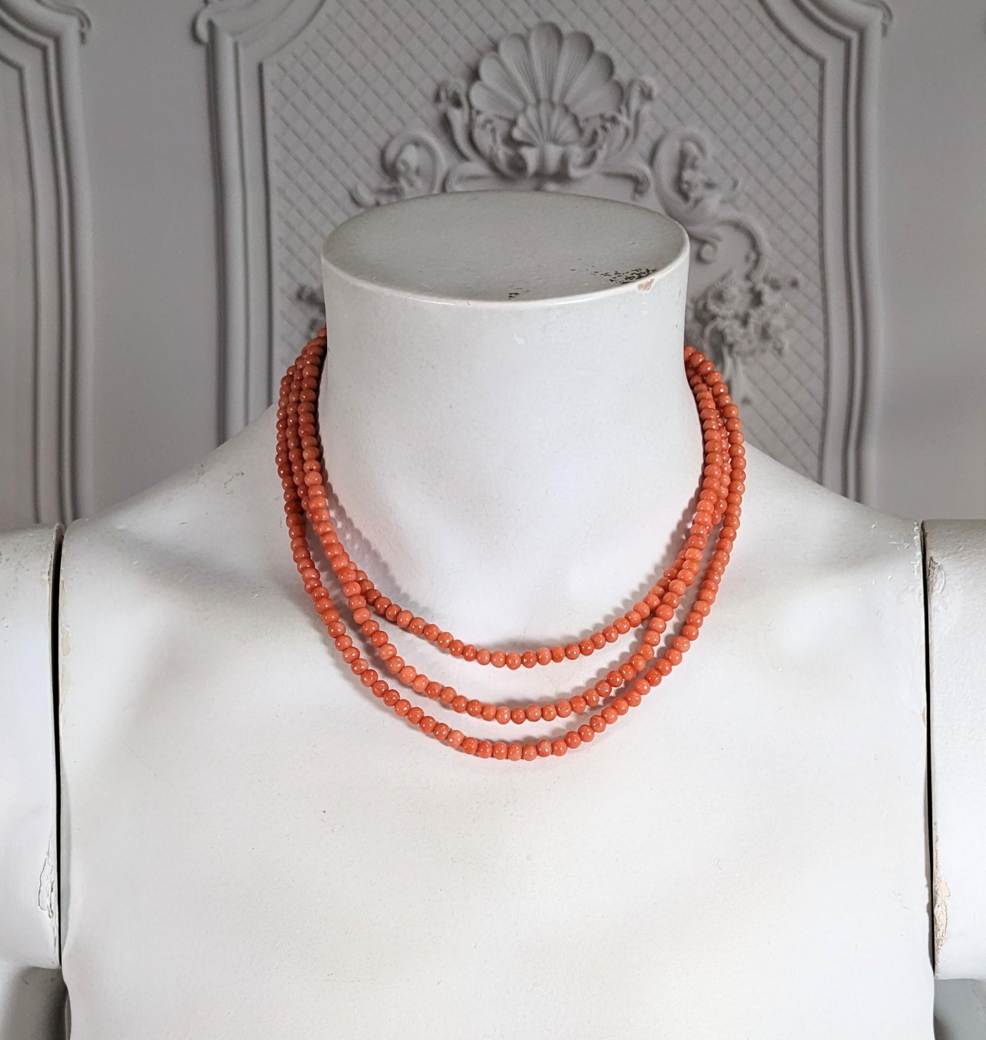 Long Victorian Genuine Coral Beads from the late 19th Century. Super versatile which can be wrapped several times on neck or wrist. Lovely salmon orange tones. 4-5 mm beads. 46