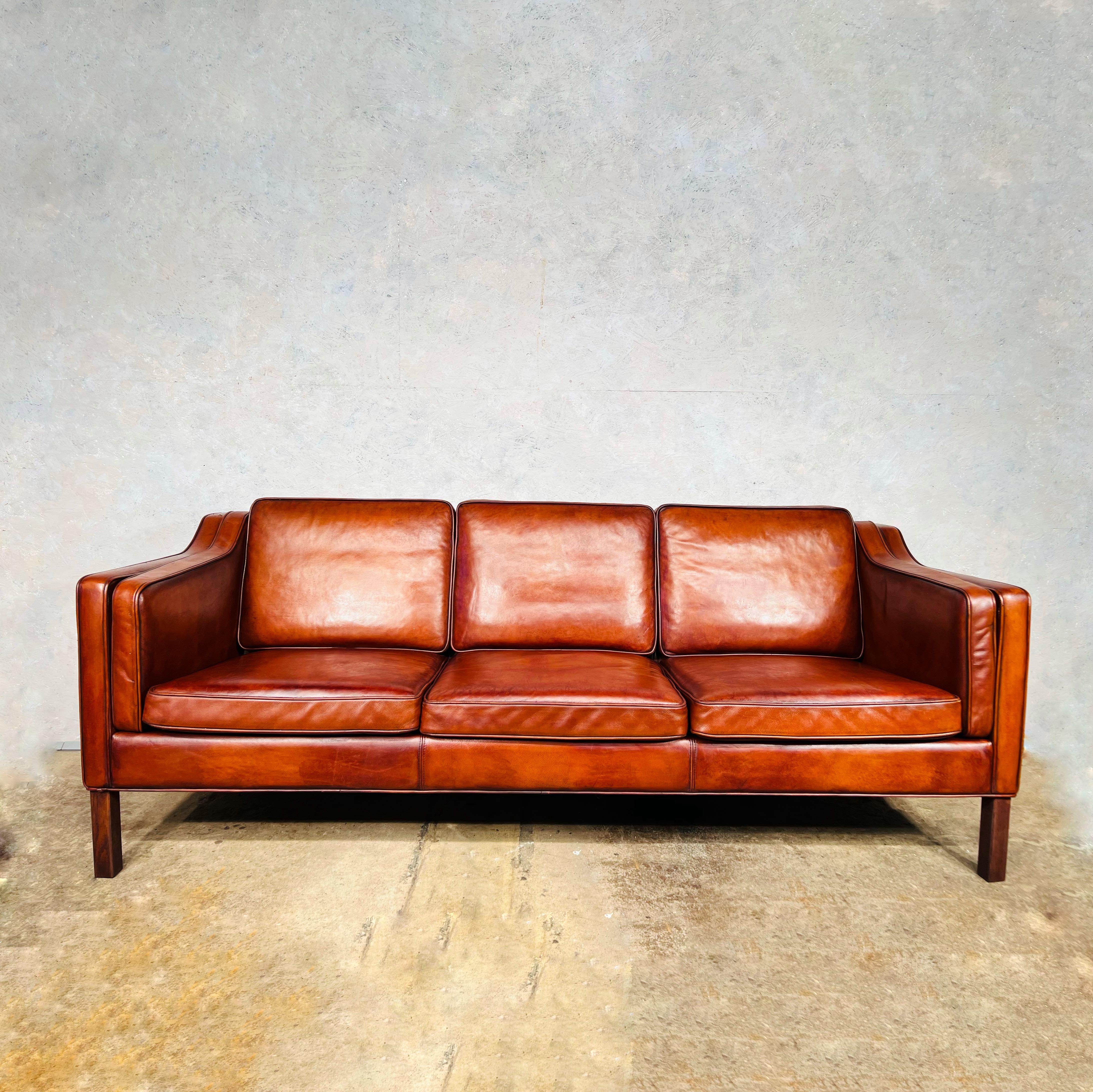 A Stylish 1970s sofa, great design with beautiful lines. Great size made with high quality leather.

The leather is a Stunning hand dyed Cognac color and has a great patina and finish.


