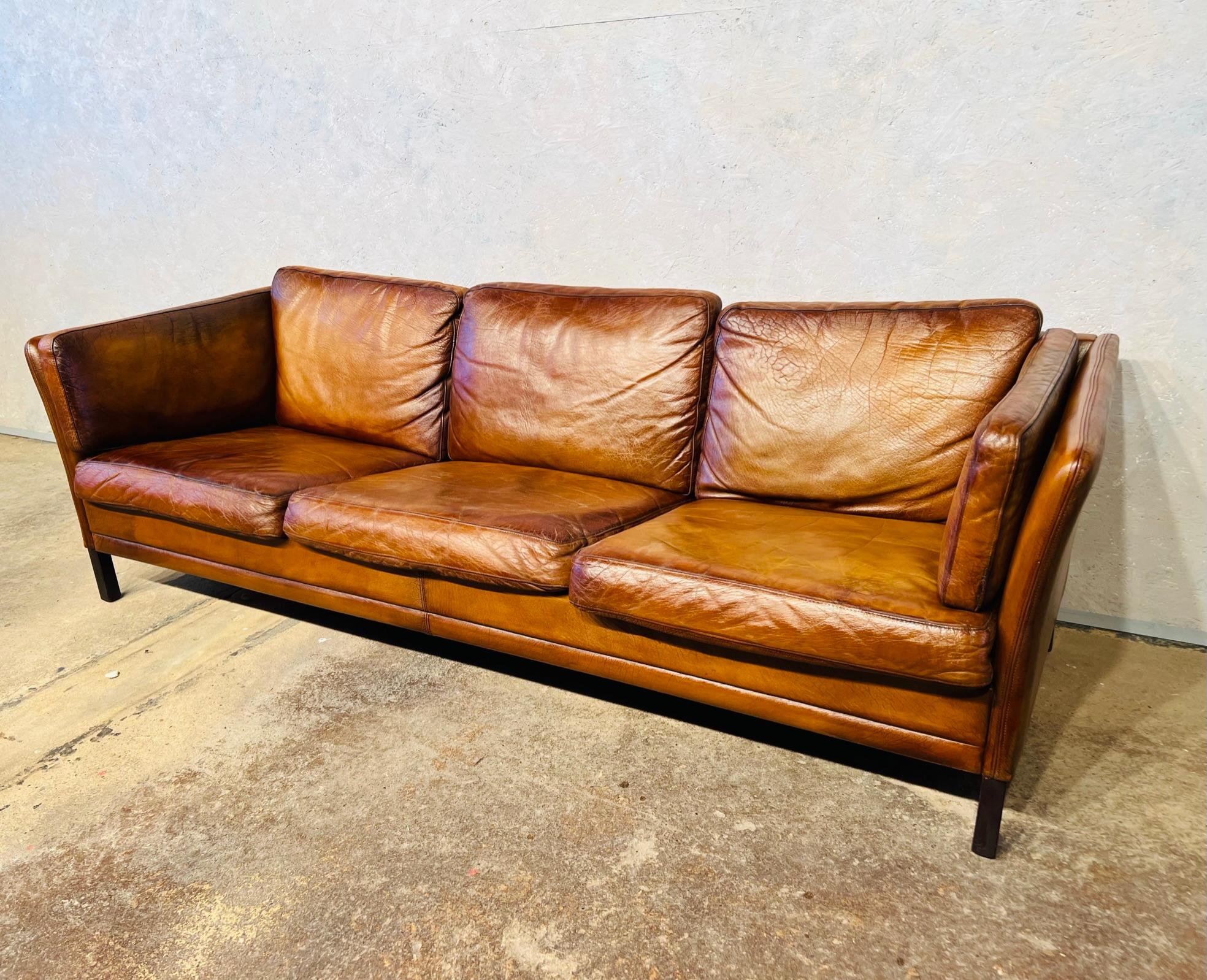 A Stylish 1970s Sofa designed by Mogens Hansen, great design with beautiful lines, sits wonderfully.

Stunning hand dyed tan colour, great patina and finish.

Viewings welcome at our showroom in Lewes, East Sussex.