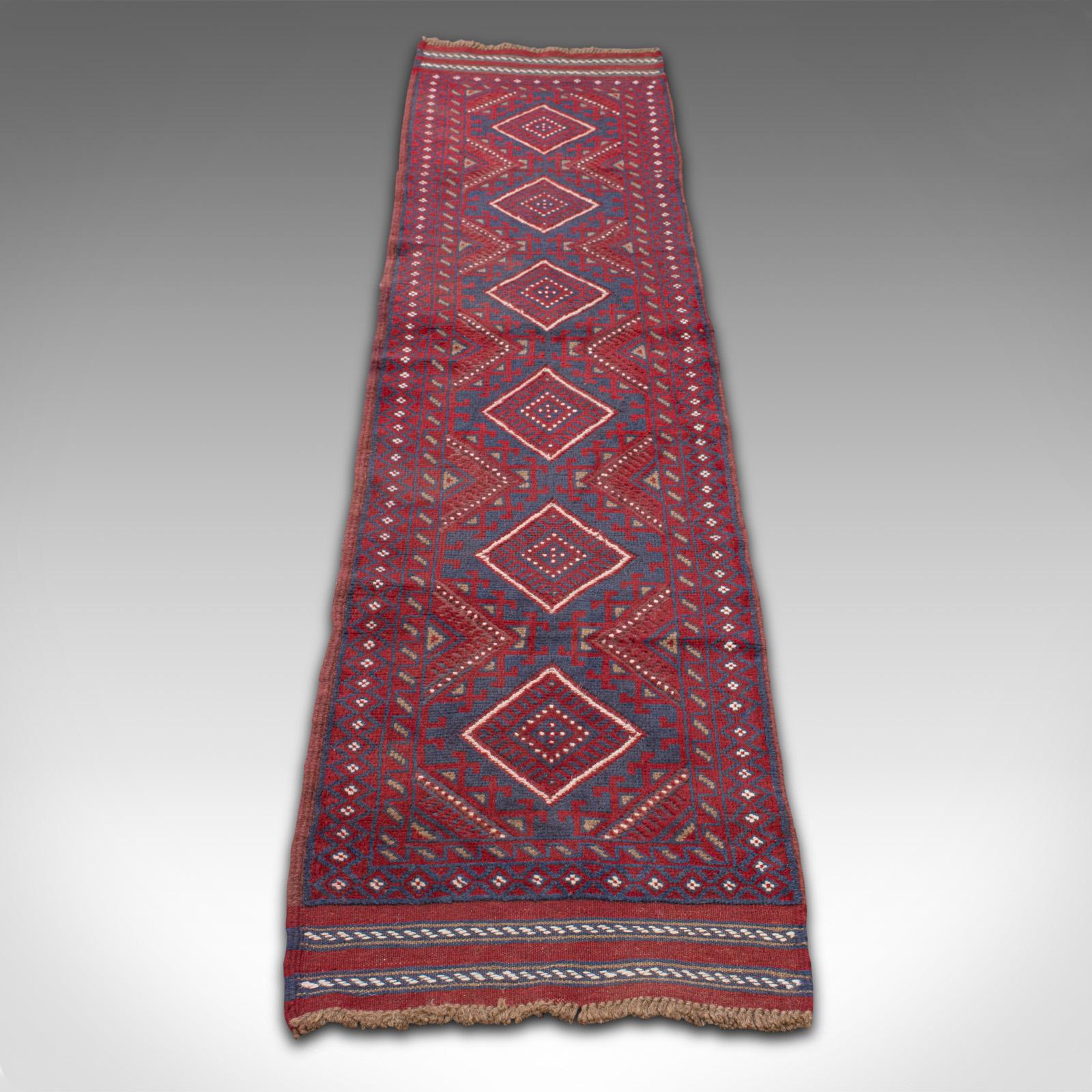 This is a long vintage Meshwani runner. A Caucasian, woven decorative rug or reception hall carpet, dating to the late 20th century.

Striking Kenareh runner size at 60cm x 280cm
Artisan hand-crafted using traditional skills with minimal wear or