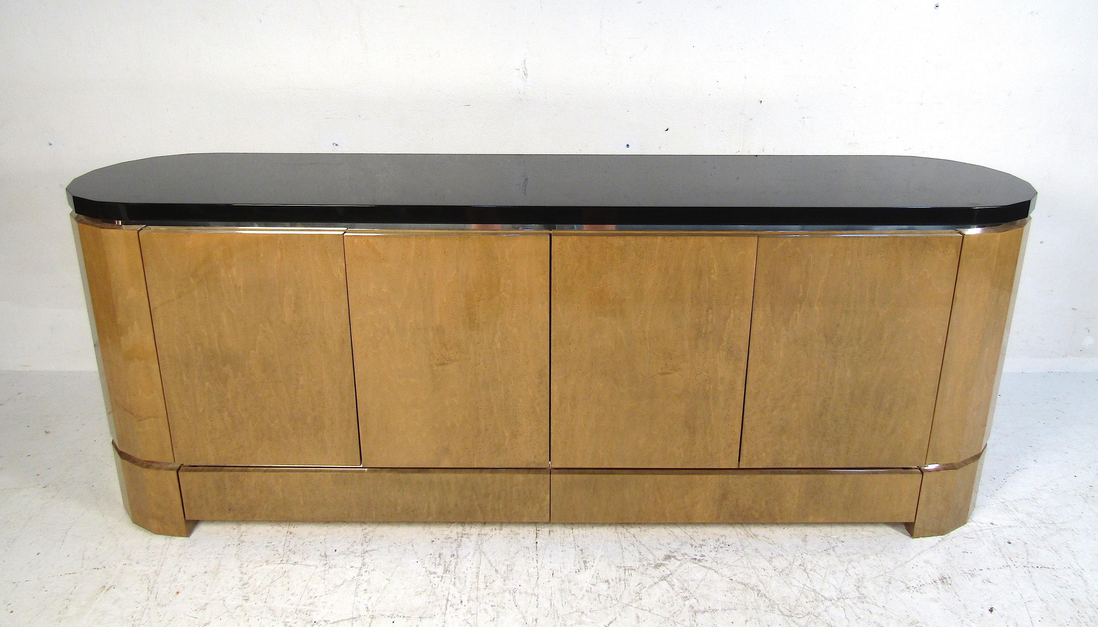 Stylish vintage sideboard. Large piece with ample storage space. Please confirm item location with dealer (NJ or NY).