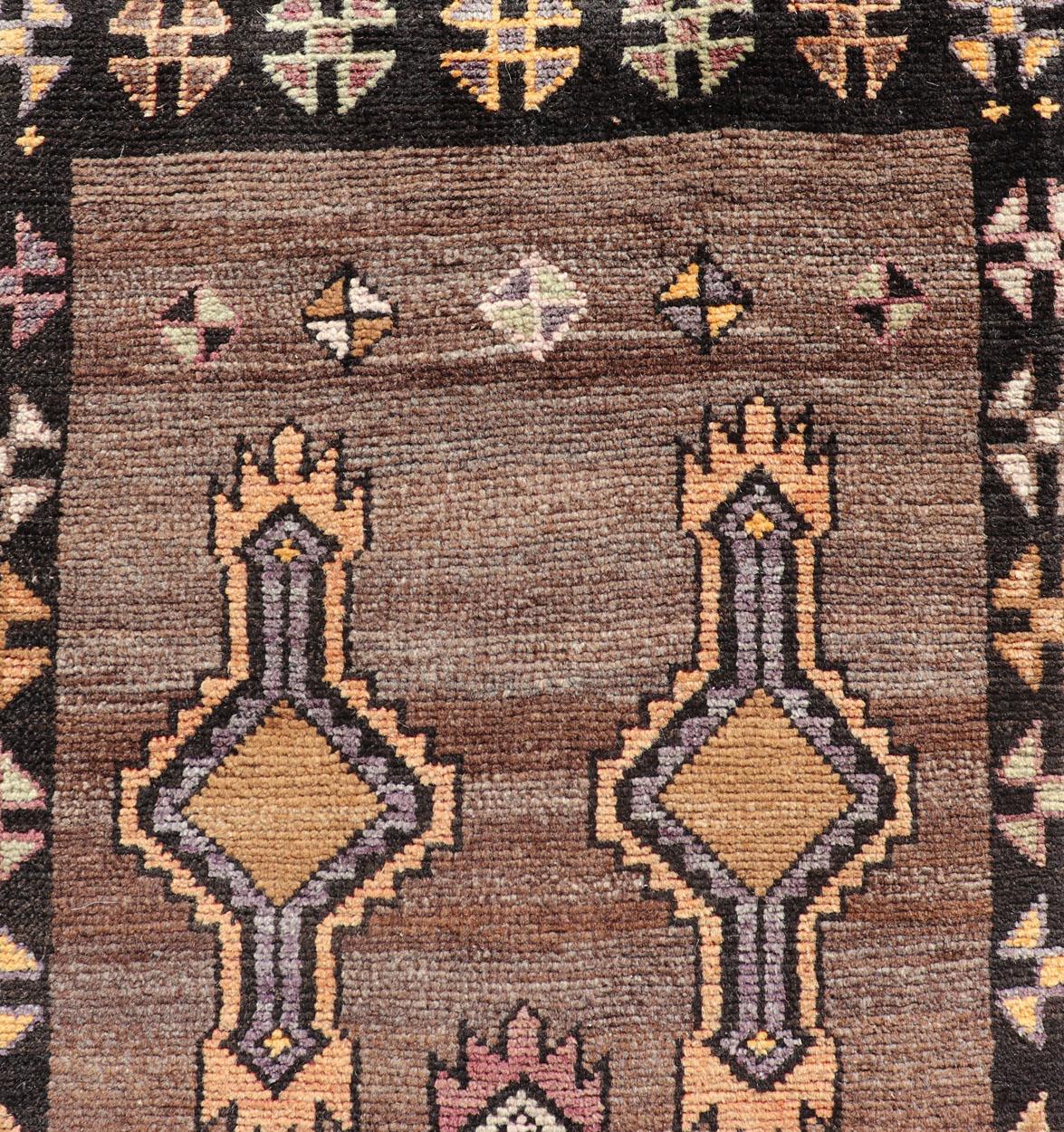 20th Century Long Vintage Turkish Kars Narrow Runner with Tribal Design For Sale