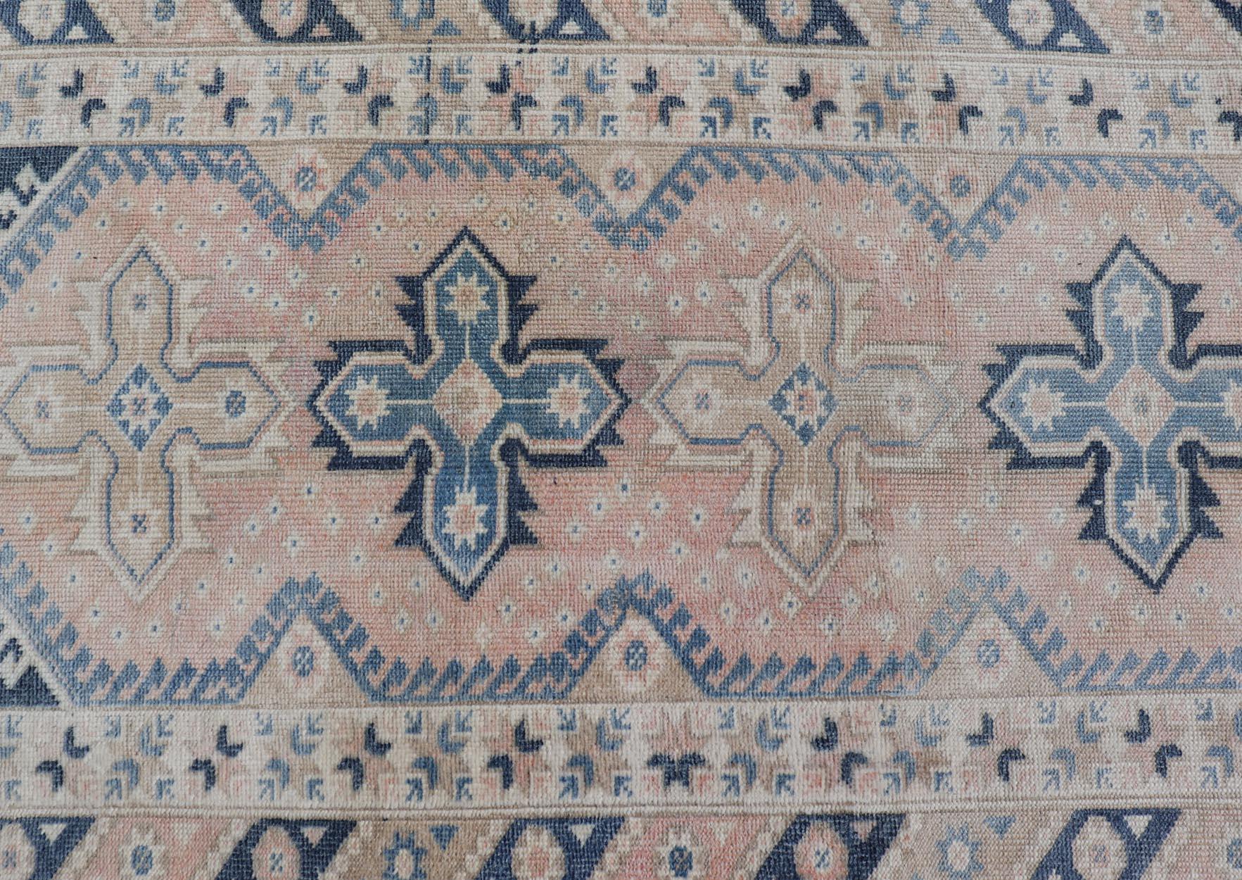 Tribal Design Vintage Turkish Oushak Runner with Blue's, Taupe and Cream. Rug EN-15349, country of origin / type: Turkey / Oushak, circa 1940.
Measures: 2'11 x 15'5 
This vintage Turkish Oushak runner features three lightly rendered, stylized