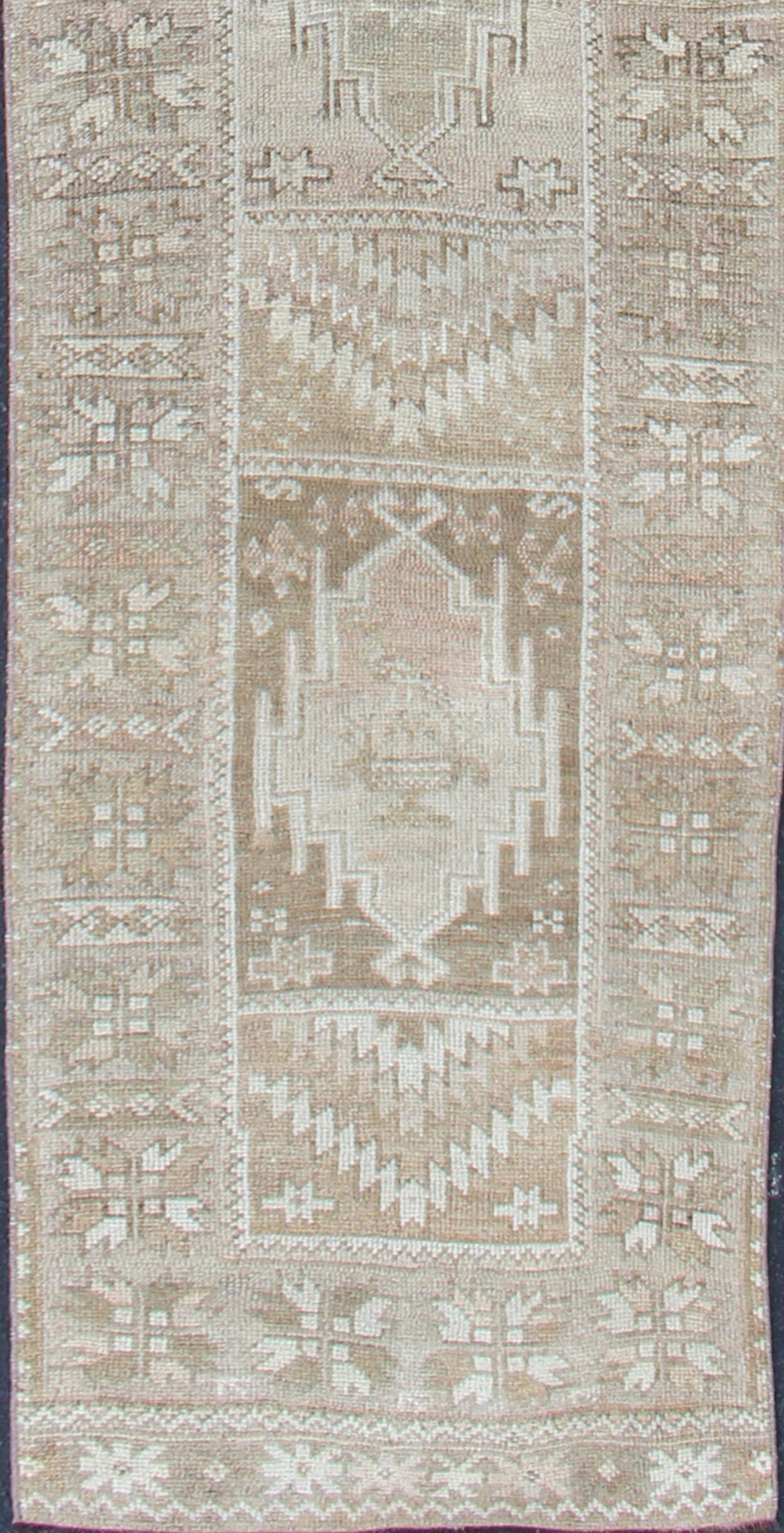 Hand-Knotted Long Vintage Turkish Oushak Runner with Medallions in Earth Tones For Sale