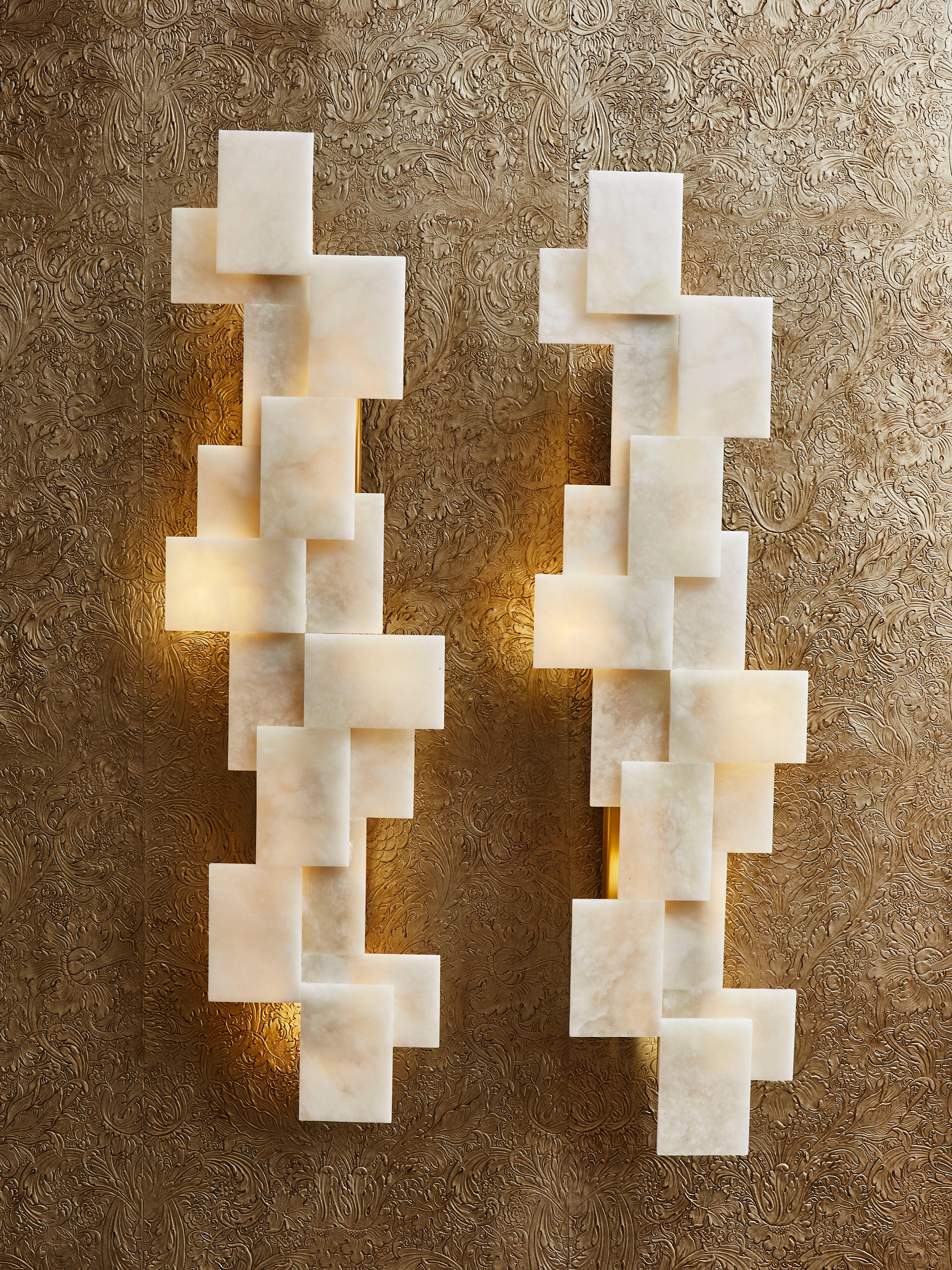 Stunning cubic wall sconces in enlightened alabaster and brass structure.
Different stone, finishes and dimensions can be ordered.
Creation by Studio Glustin.
France, 2020.