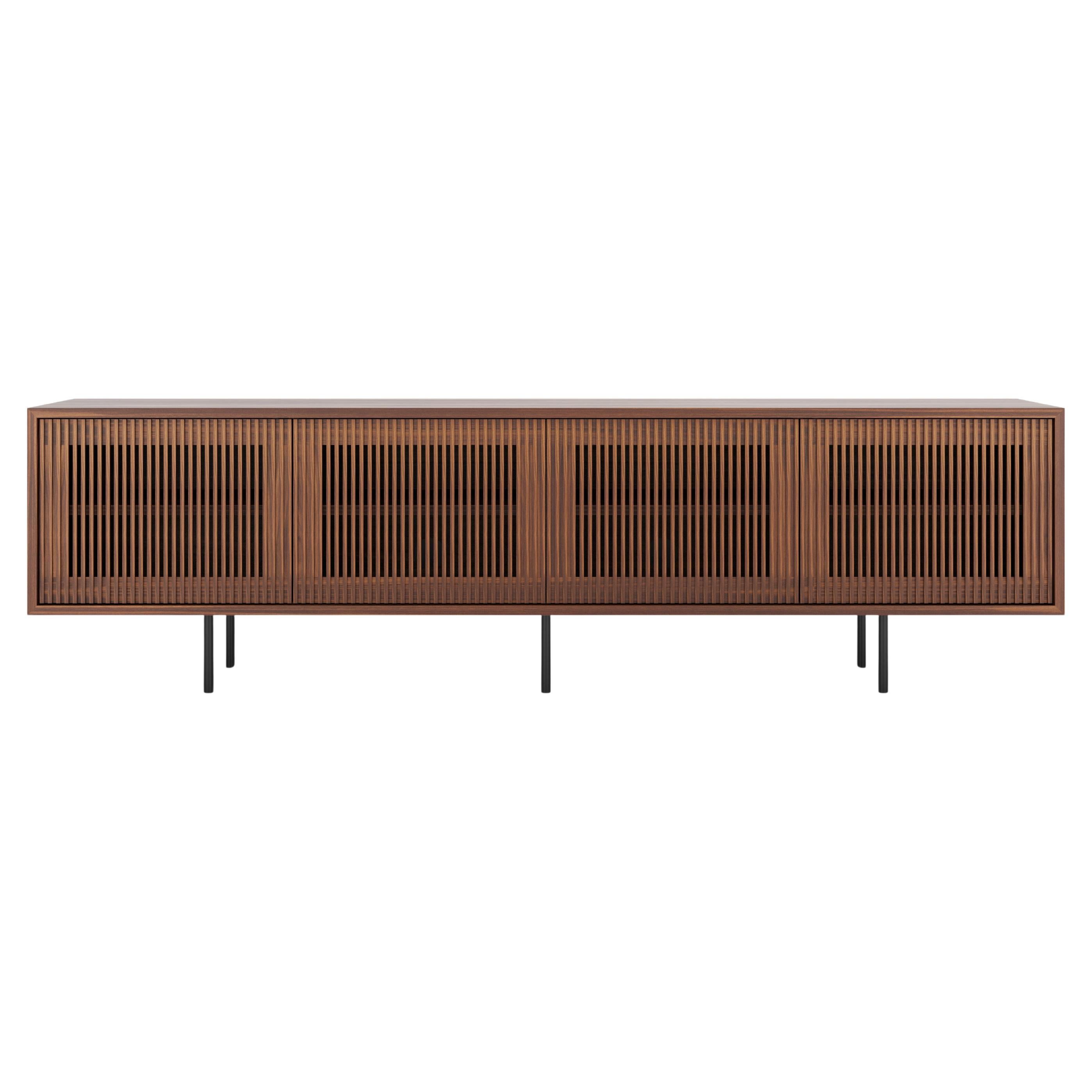 Long walnut sideboard TV stand with slatted doors in mid century modern style