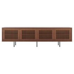 Long walnut sideboard TV stand with slatted doors in mid century modern style