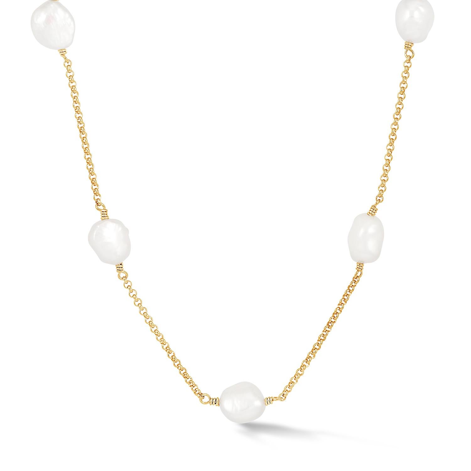 Made in our London studio, this sterling silver long necklace features large, lustrous white baroque freshwater pearls suspended on fine chain. Baroque pearls are naturally irregular in shape and known for their one-of-a-kind nature. 

The 40 inch