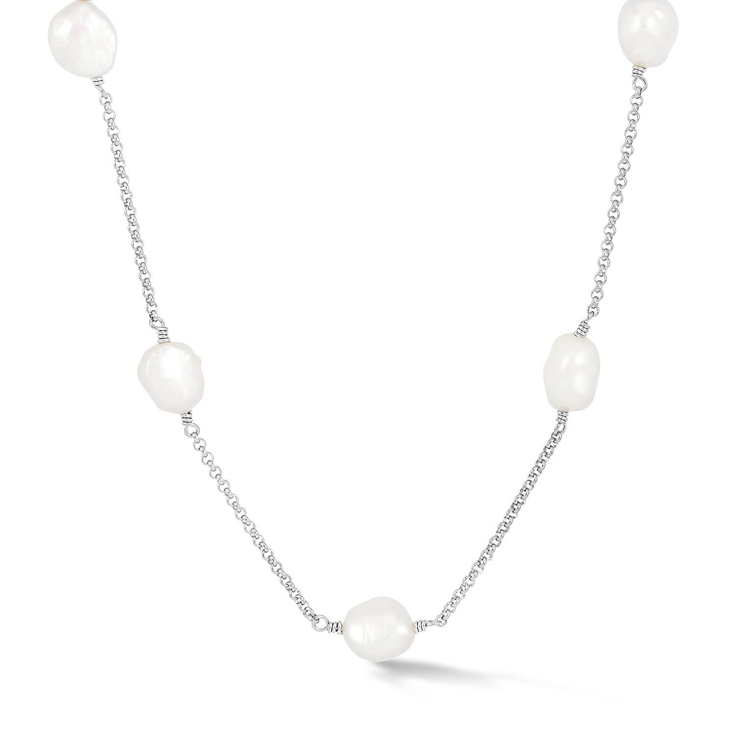 Made in our London studio, this sterling silver long necklace features large, lustrous white baroque freshwater pearls suspended on fine chain. Baroque pearls are naturally irregular in shape and known for their one-of-a-kind nature.

The 40 inch