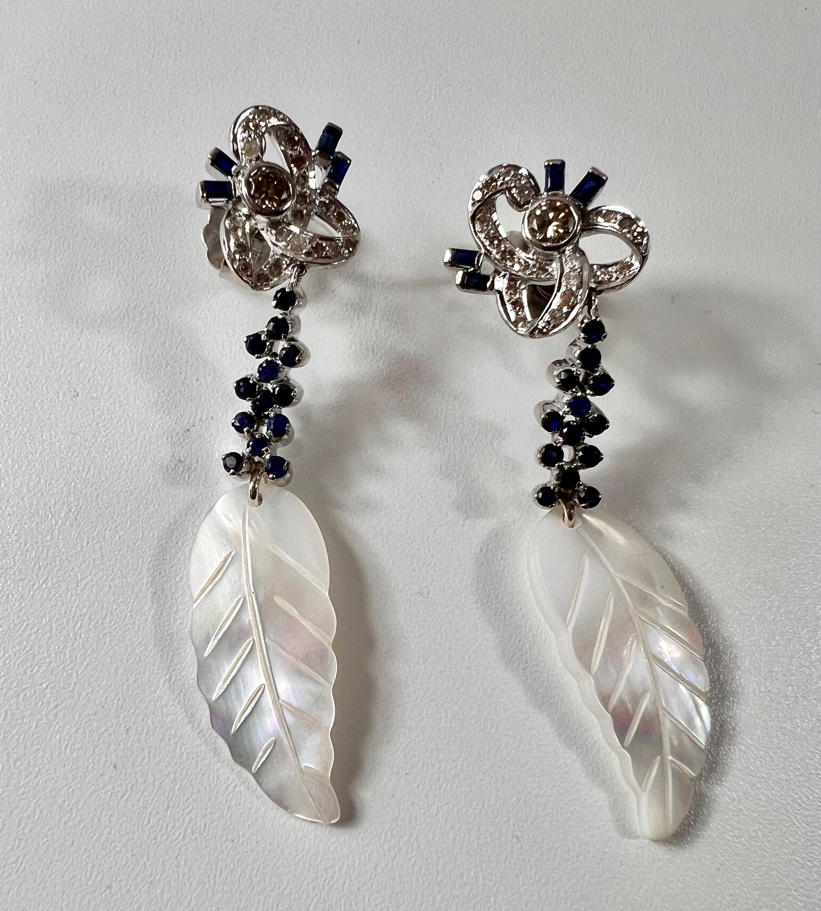 Contemporary Long White Gold Earrings with Diamonds and Sapphires and Mother of Pearl Feather For Sale