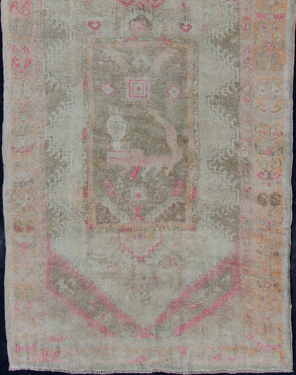 Long vintage runner, wide vintage runner from Turkey with vertical medallion design in green, purple, gray, pale orange and nude rug en-176012, country of origin / type: Turkey / Oushak, circa 1940.

This beautiful vintage Oushak runner from 1940s