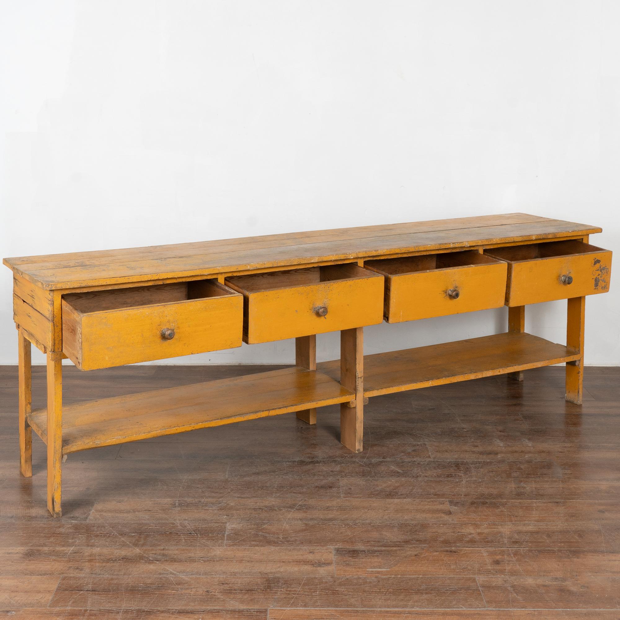 Rustic Long Yellow Painted Work Table with Four Drawers and Shelf, Hungary circa 1890