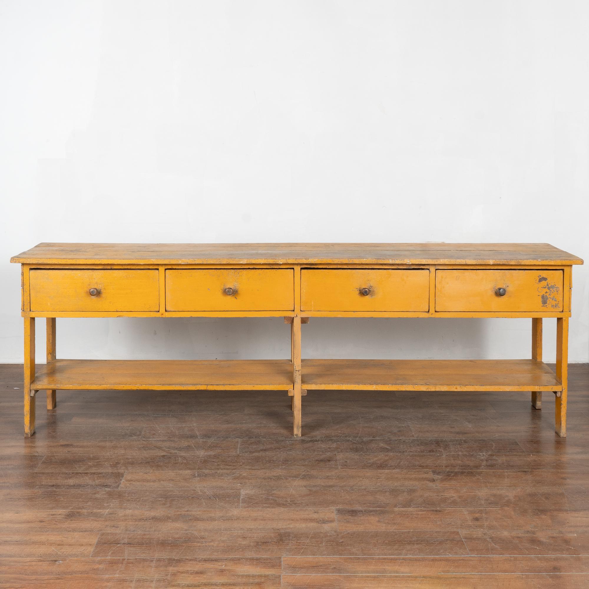 Hungarian Long Yellow Painted Work Table with Four Drawers and Shelf, Hungary circa 1890